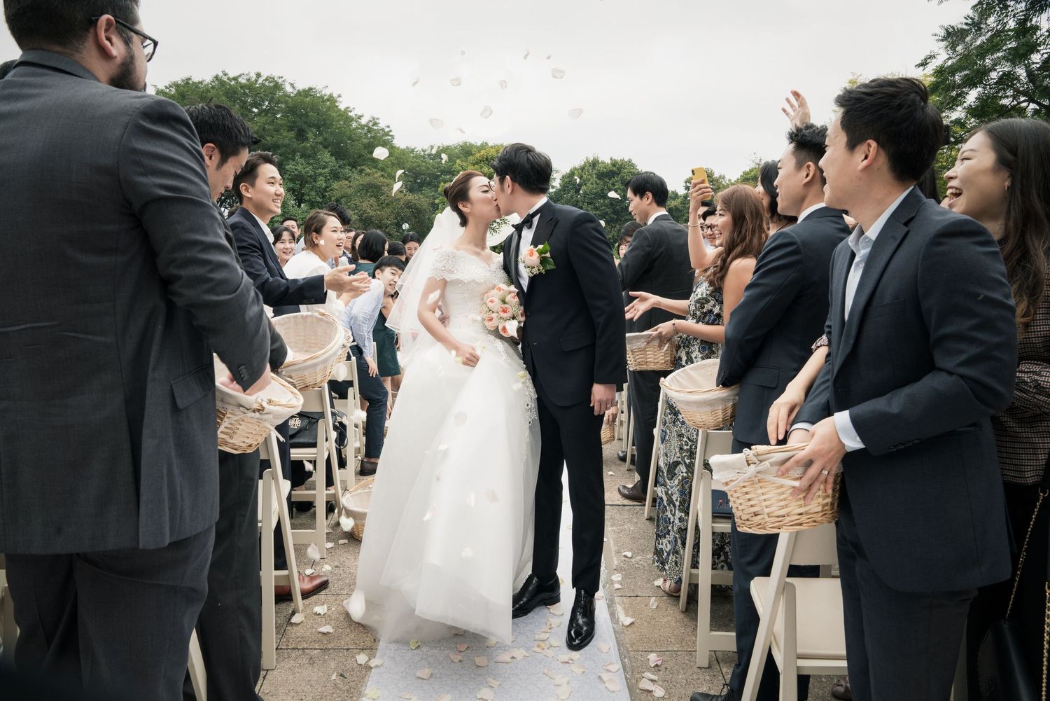 Sequence of wedding ceremony photos showing celebration and formal gatherings outdoors in garden setting.