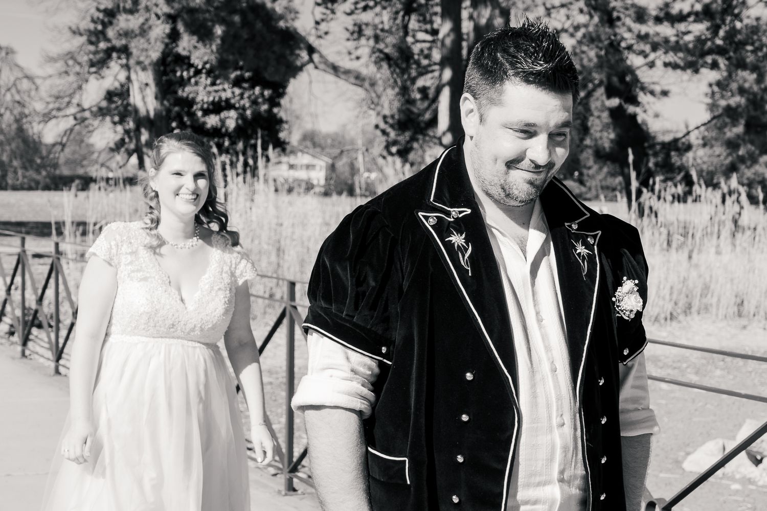 A black and white wedding photo collage showing happy couples in outdoor settings.