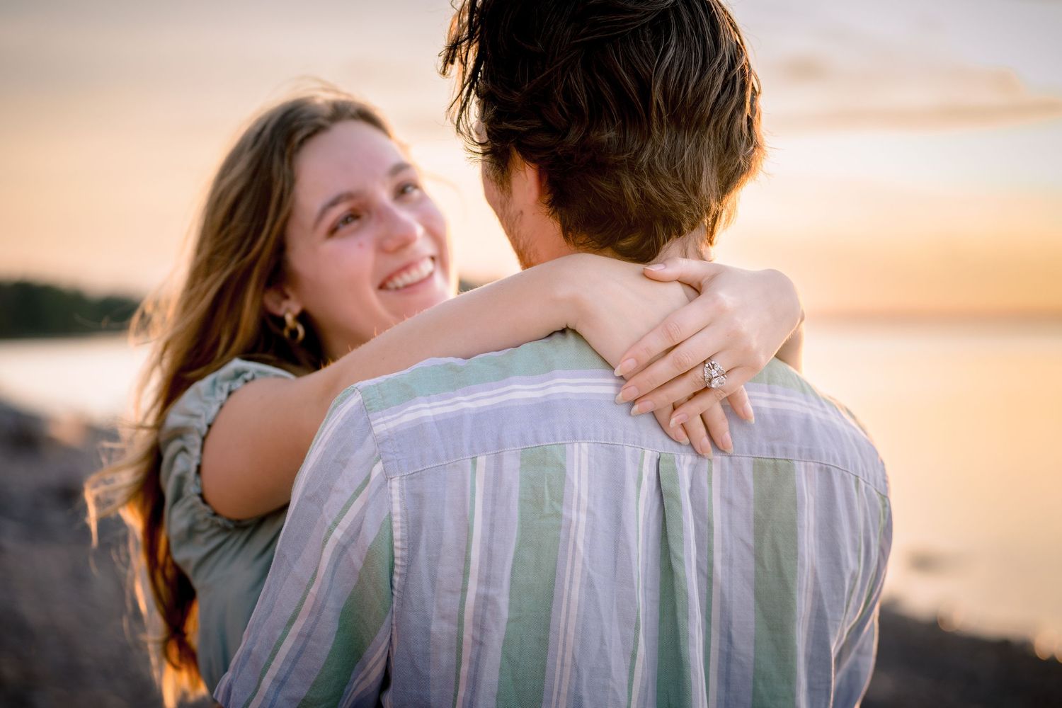 A couple embraces on a beach during golden hour sunset with multiple candid shots showing their affection.