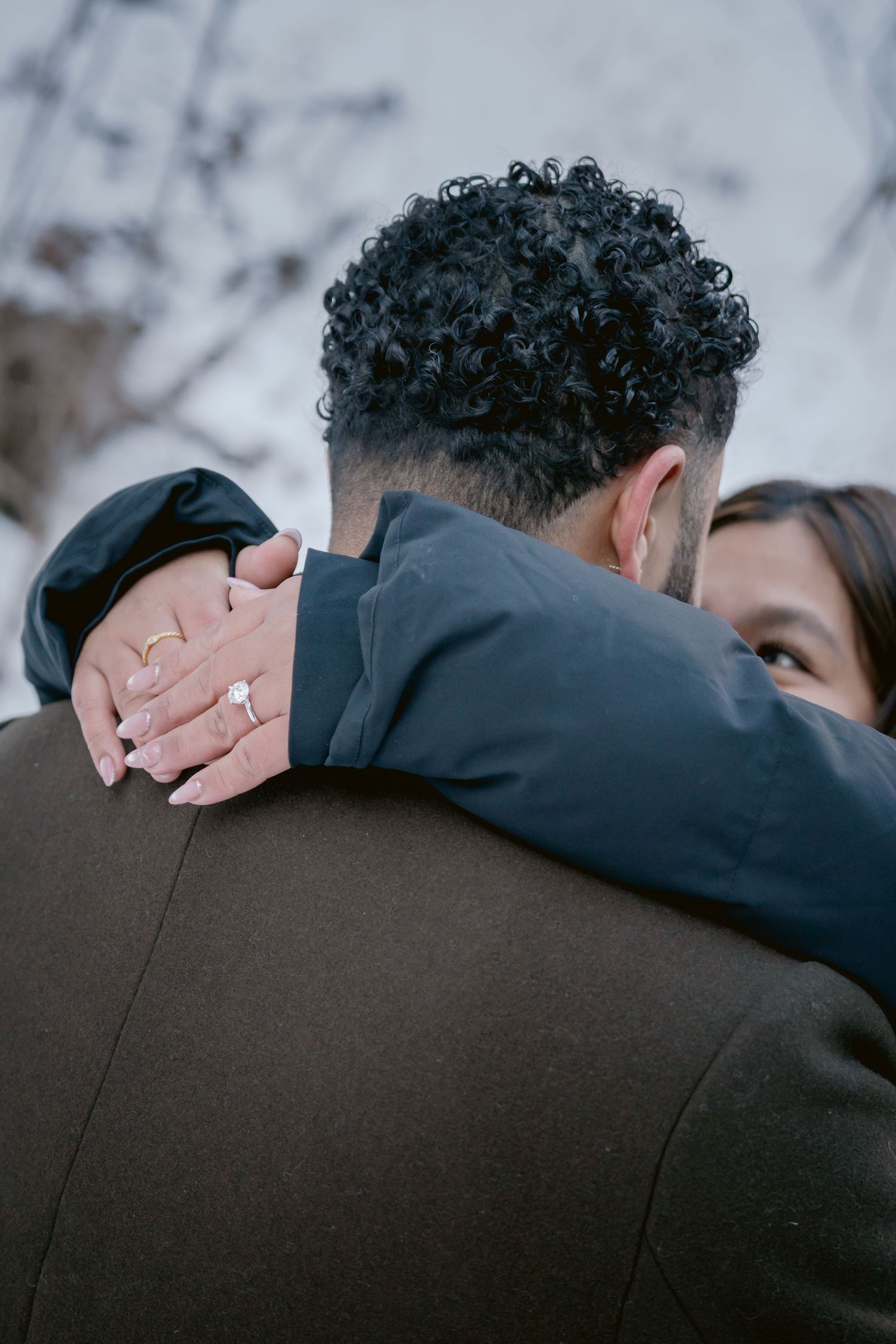 A tender moment between a couple embracing, showing affection and intimacy in a series of close-up shots.