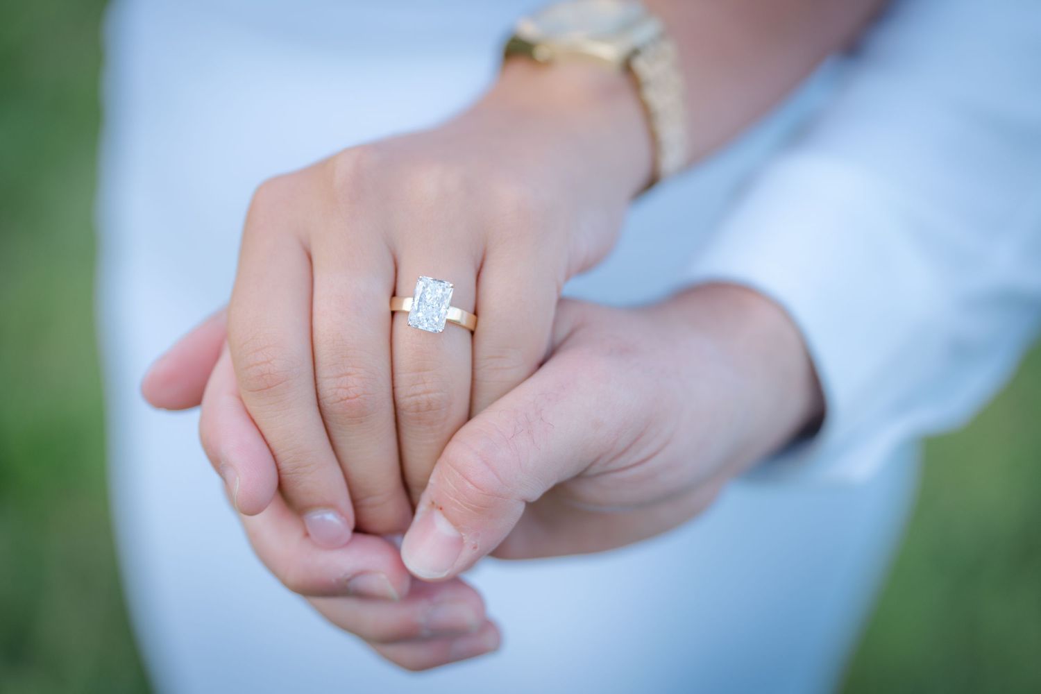 Close-up photos showing a sparkling diamond engagement ring on a hand against various backgrounds.