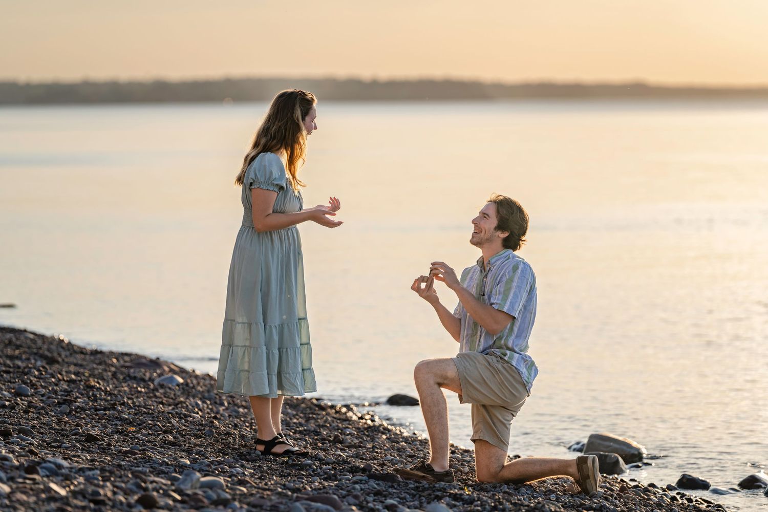A romantic sunset beach proposal captured in a series of photos showing a couple during a special moment by the water.
