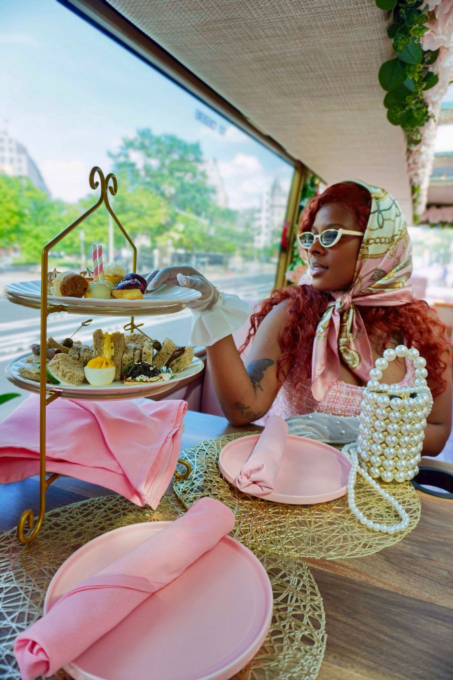 Pretty in pink and steeped in style aboard the ultimate tea party bus! 💕☕ #TeaAroundTown #PinkPartyBus #AfternoonTeaExperience