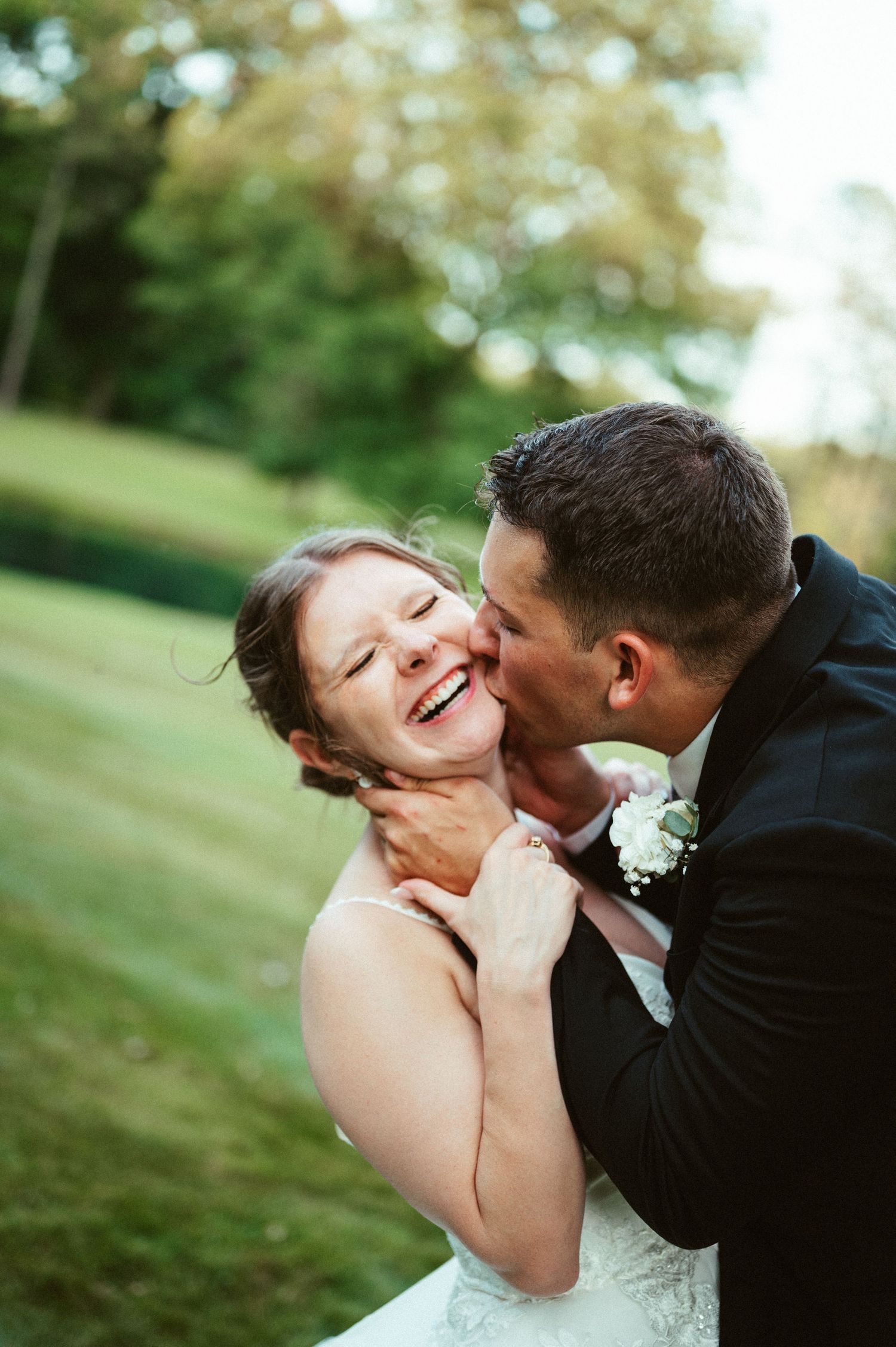 A romantic wedding photo sequence shows a tender kiss between newlyweds in an outdoor garden setting.