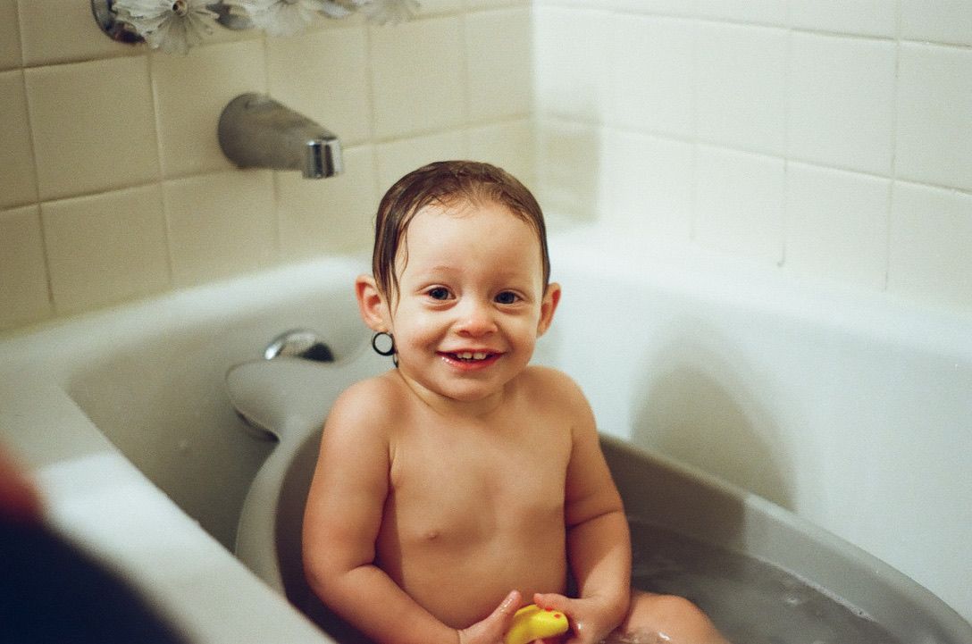 In-home toddler personality photo on film by Faith's Flicks. Now booking family sessions with film 
