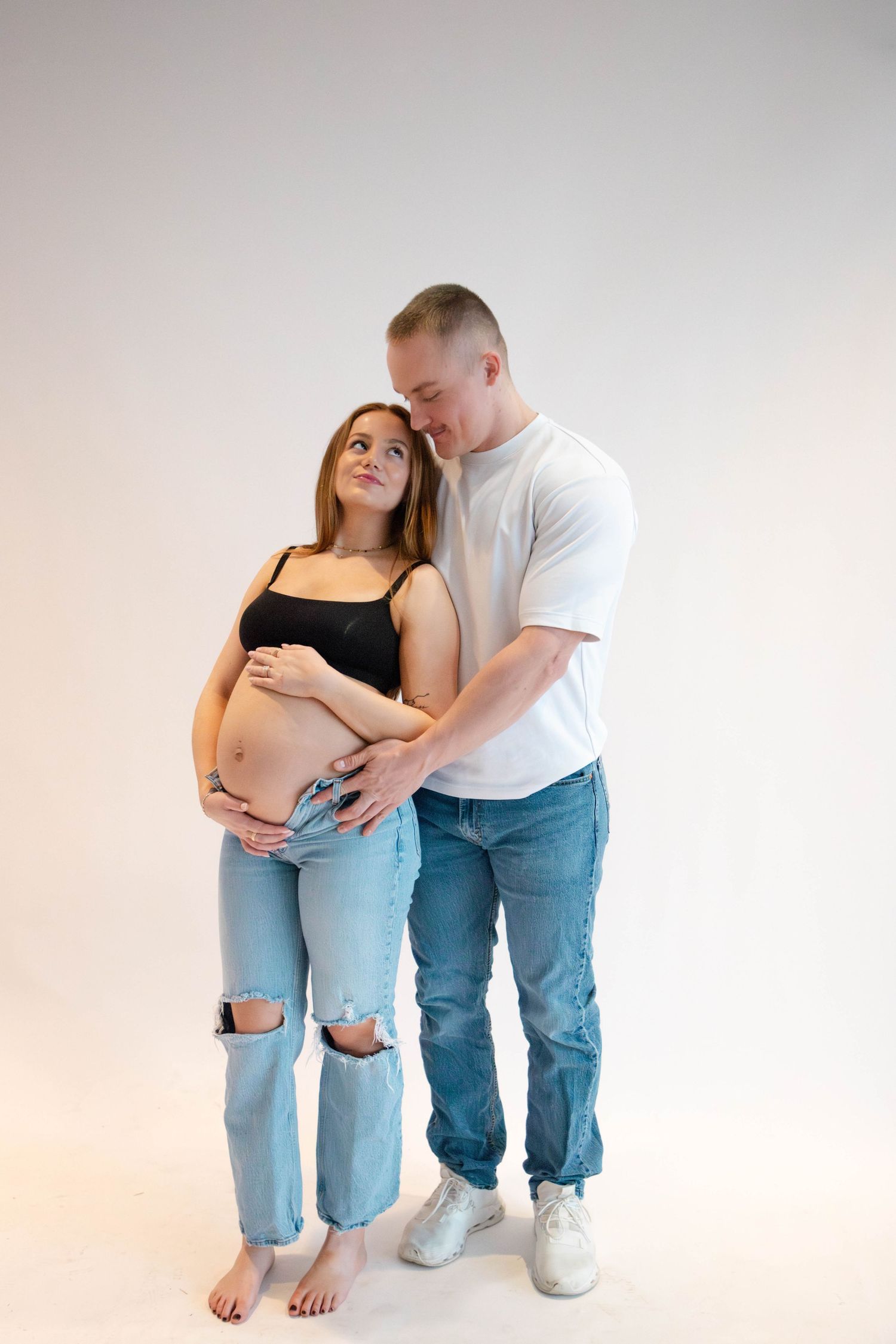 Studio maternity photos in Cincinnati, OH. Family photography by Faith's Flicks by Faith Rodriguez, Now booking 2026.