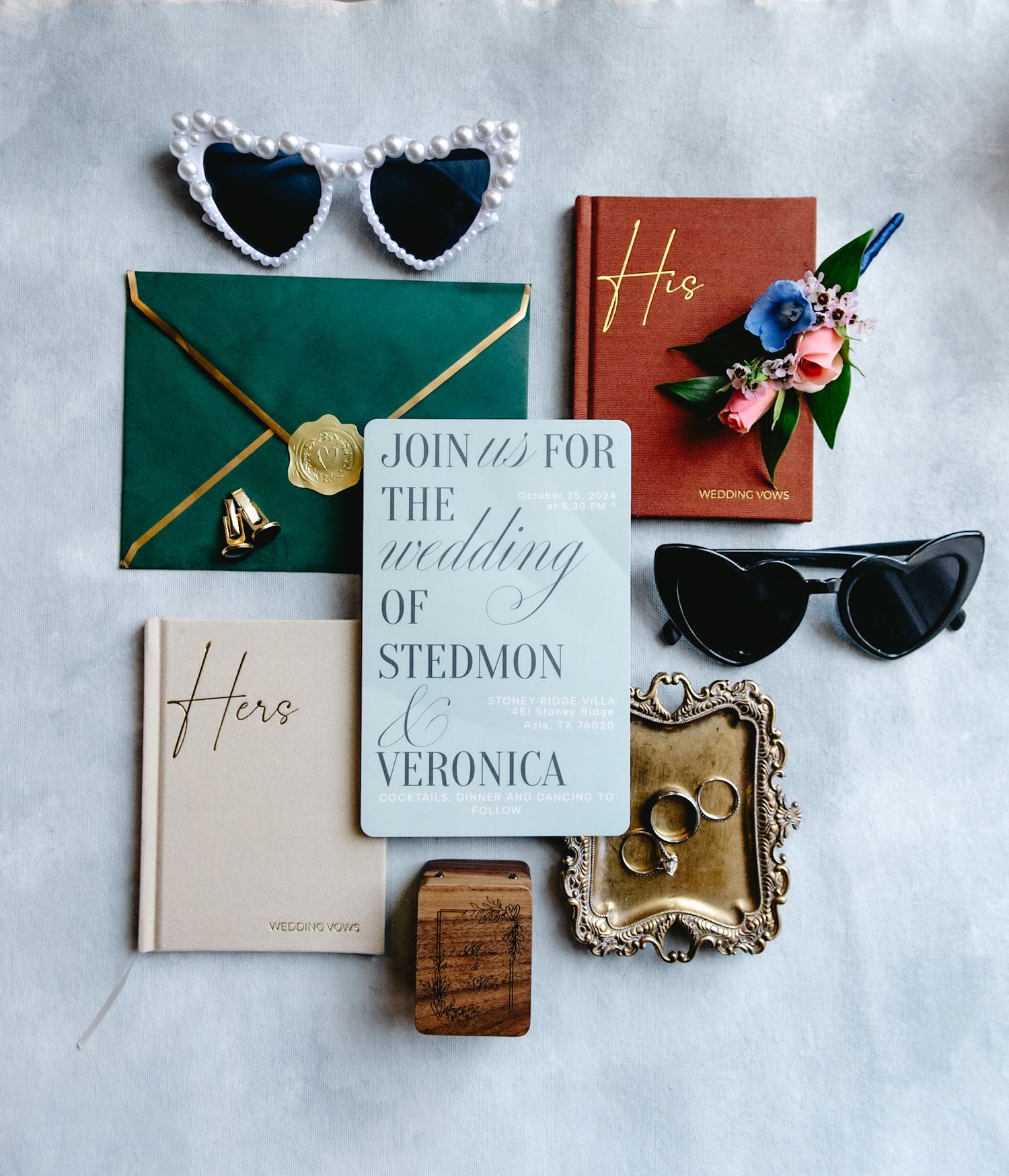 Wedding invitation suite with elegant calligraphy and green accents on white background.
