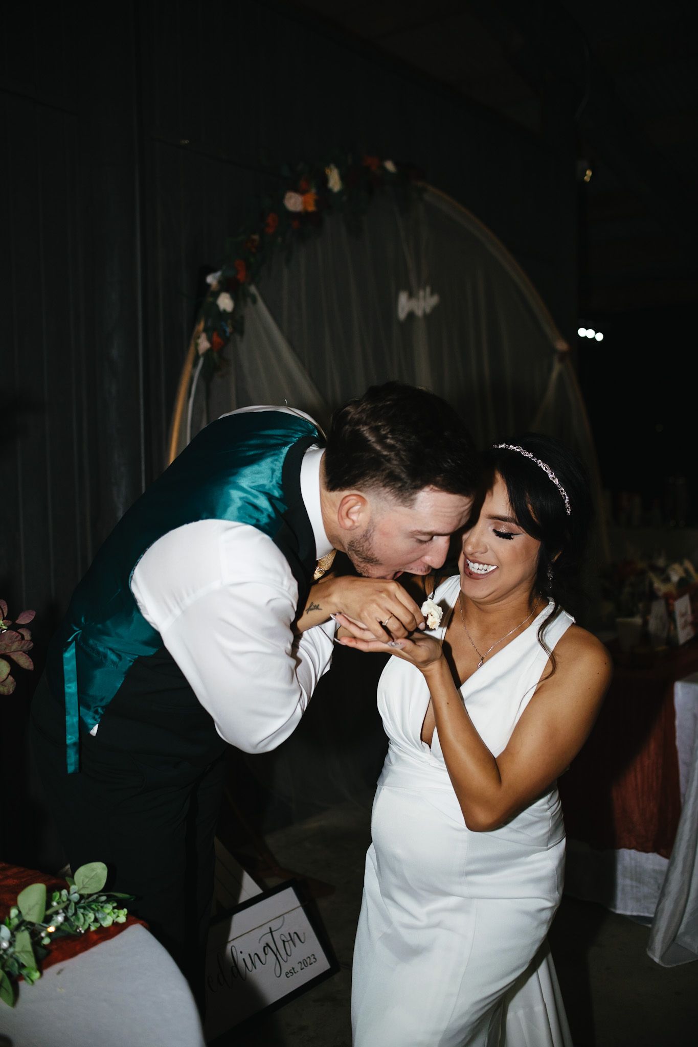 Intimate dance floor moment captured at a wedding reception.
