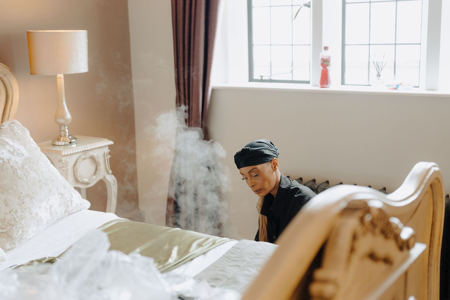 A serene bridal preparation room with natural light streaming through windows.