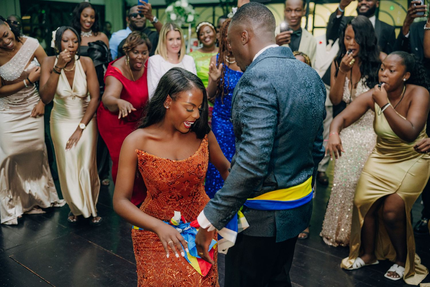 Wedding reception dance floor filled with guests enjoying the celebration.
