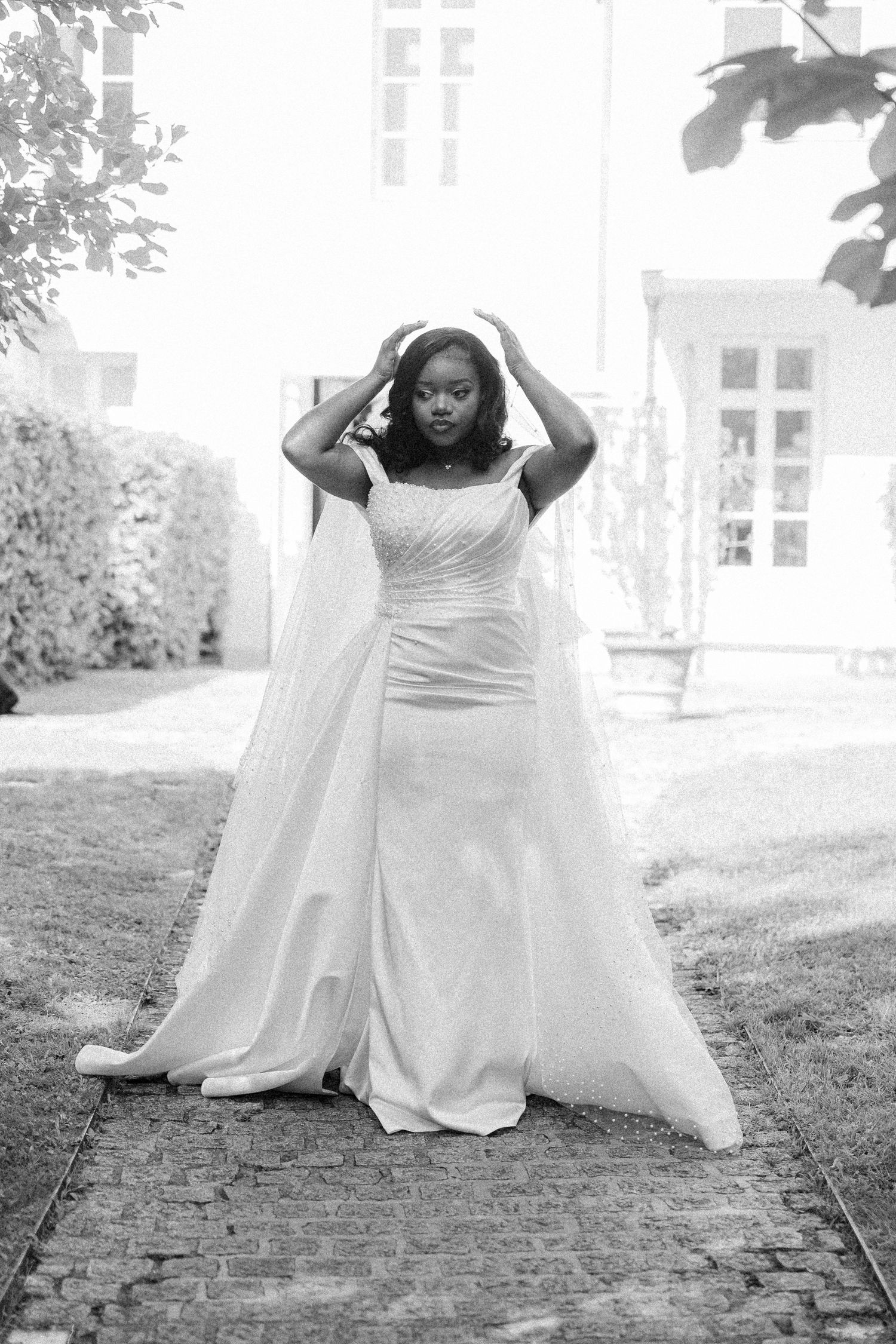 A sequence of artistic black and white bridal portraits showing flowing white dress movement outdoors.