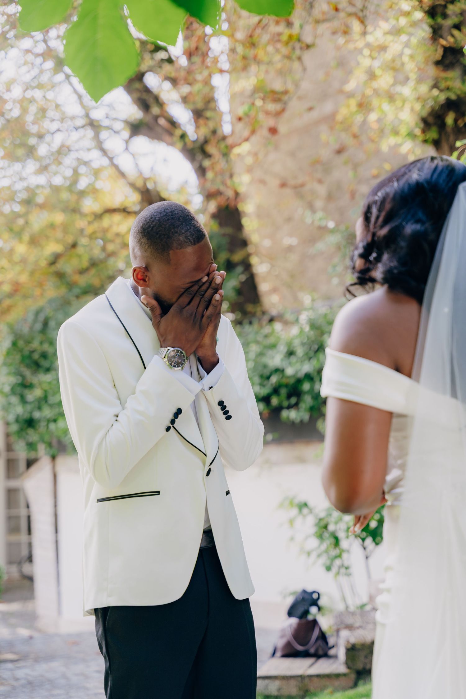 An emotional first look moment captured between a couple during their wedding ceremony.