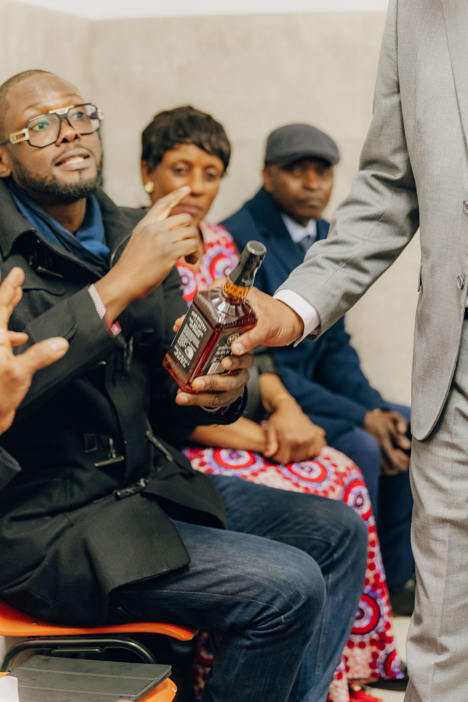 A group enjoys beverages together at a social gathering.