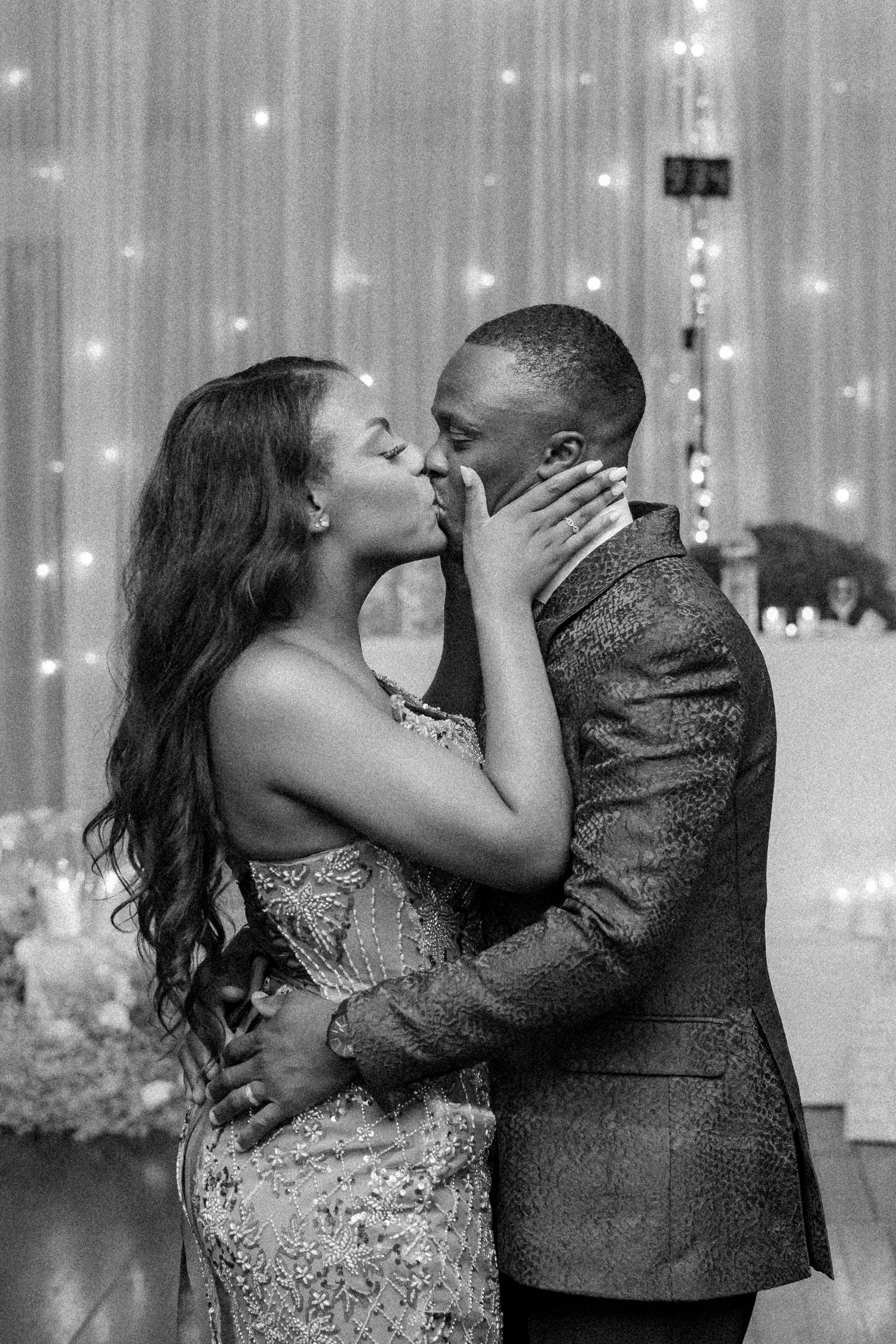 A sequence of four black and white photos showing a couple sharing tender moments while dancing at an elegant reception.