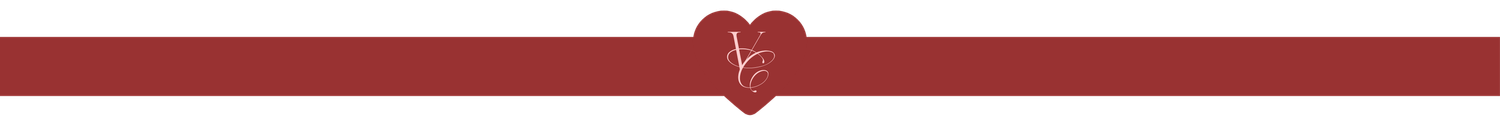 Thin dark red horizontal divider bar with small heart and monogram accent.
