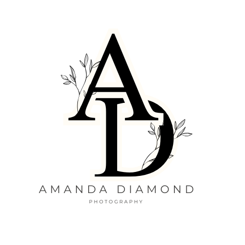 Elegant black and white monogram logo design for Amanda Diamond Photography with floral accents.
