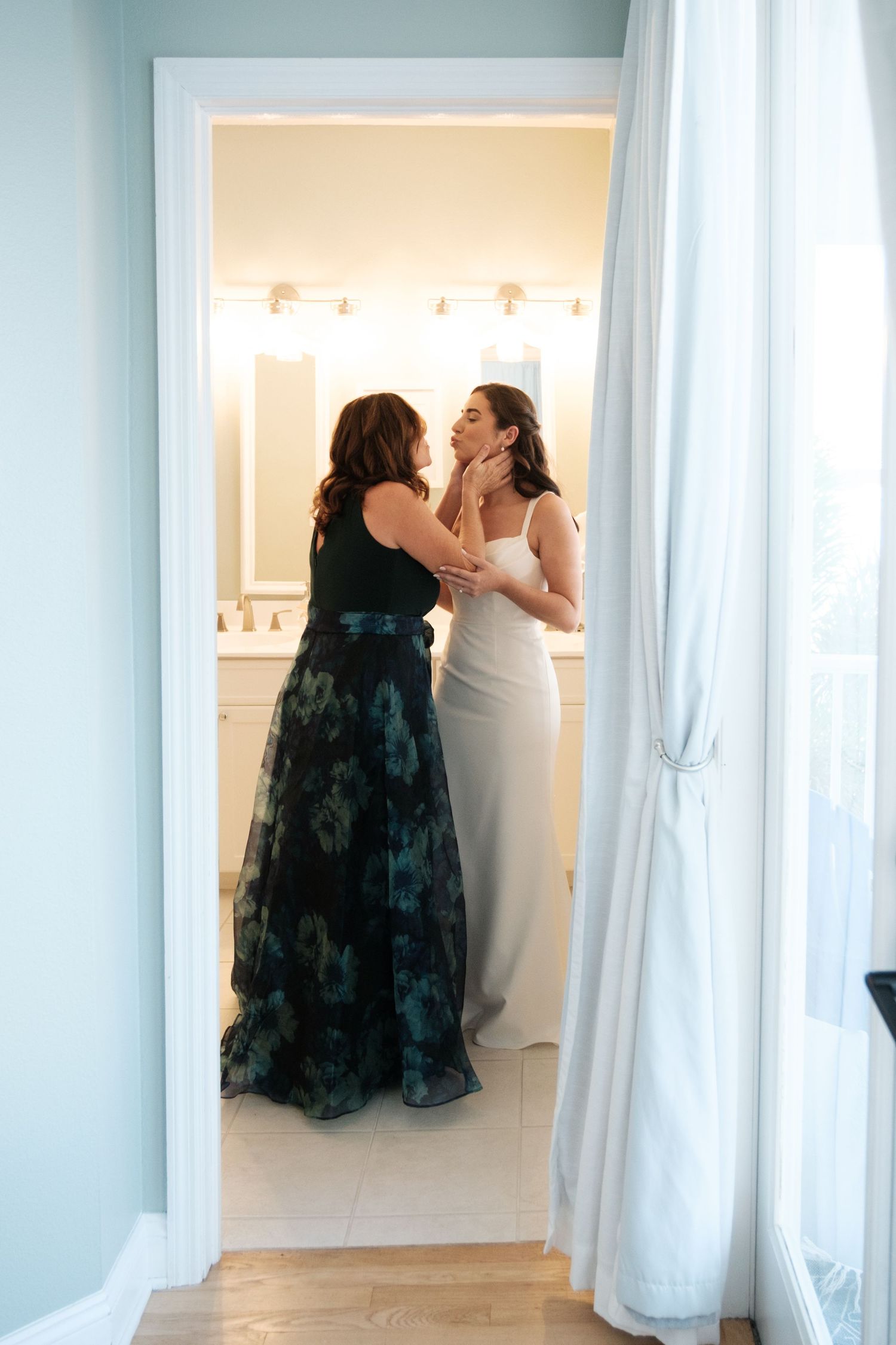 Wedding photography sequence showing tender moments in a light-filled room with white curtains.