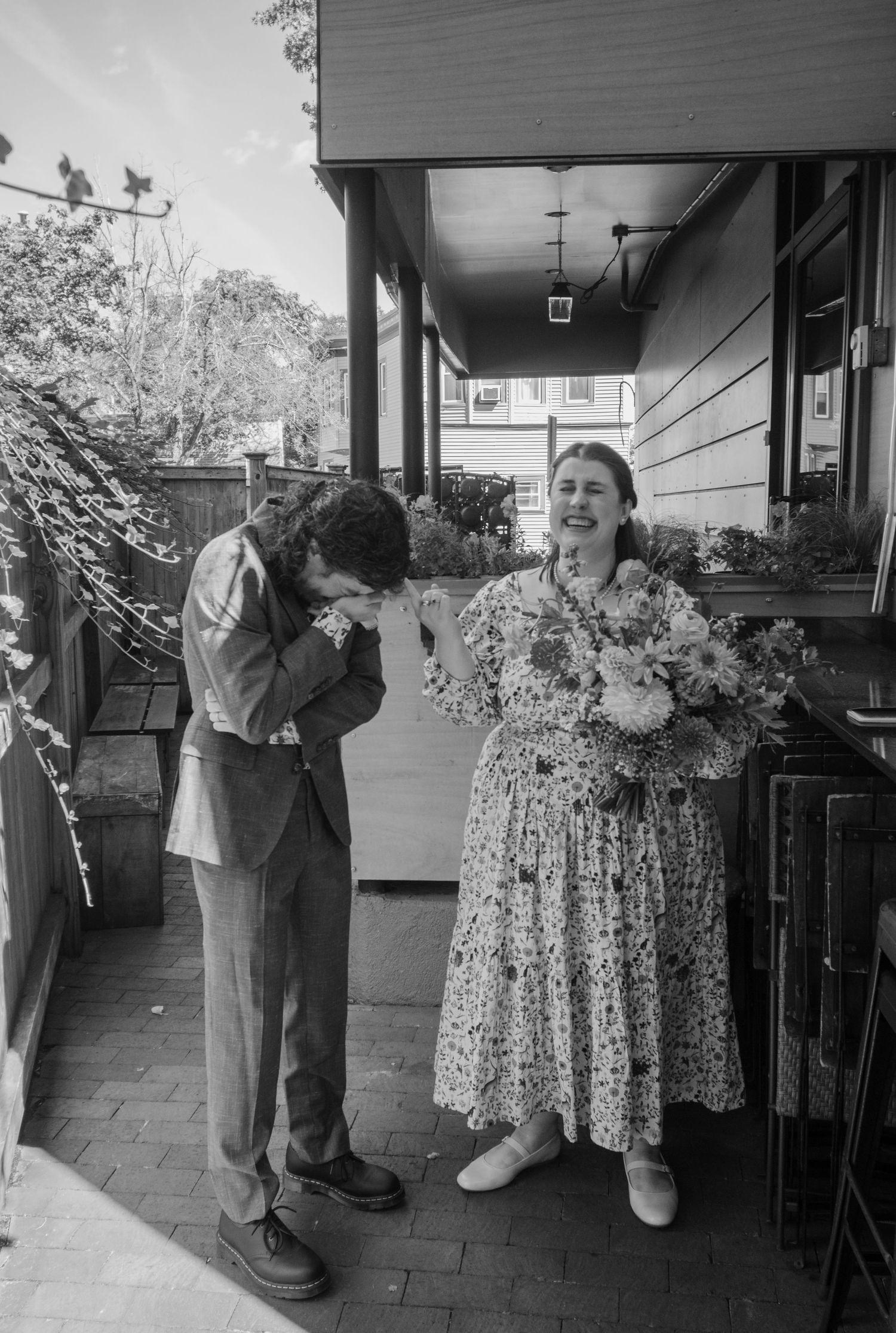 A series of black and white photos showing a couple dancing together in a vintage setting.