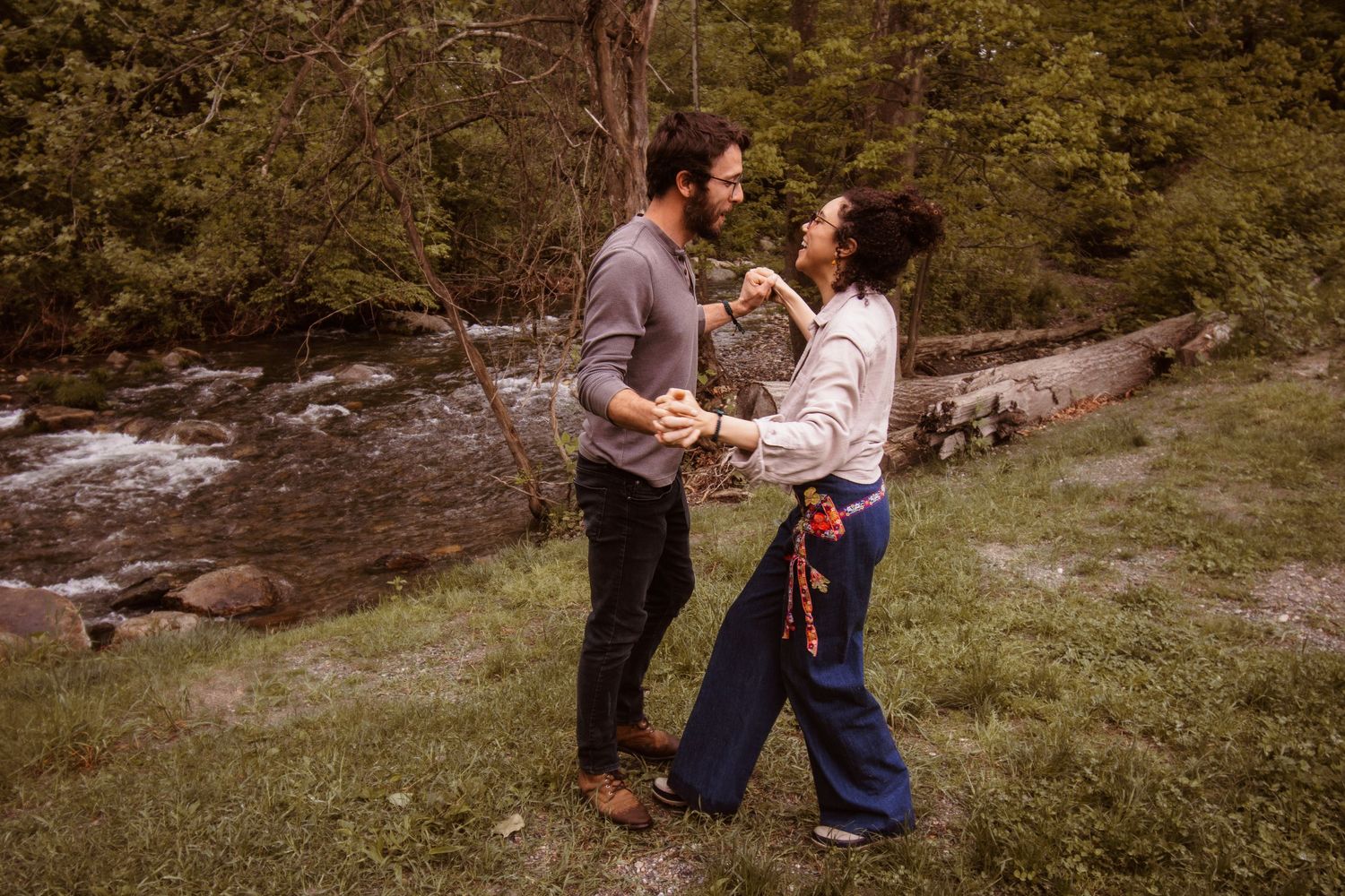 A couple shares tender moments together in a scenic outdoor setting across multiple candid photographs.