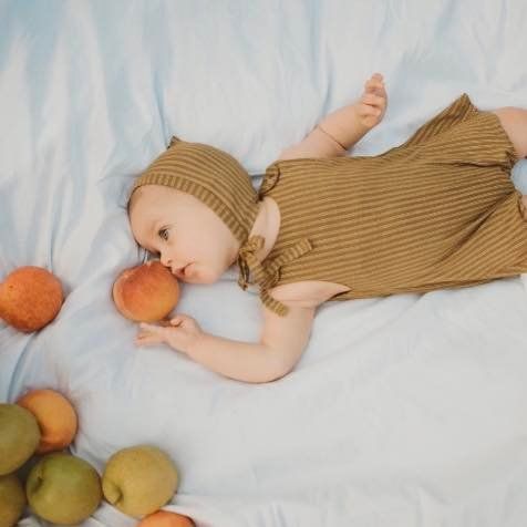 Artistic newborn photoshoot outdoors