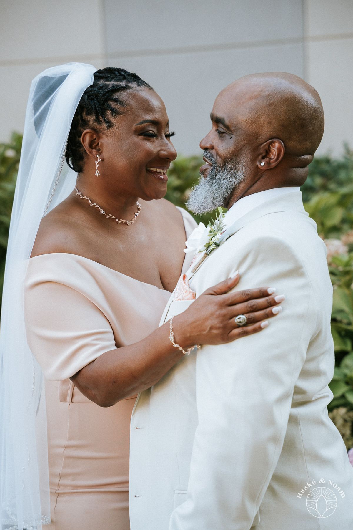 Bride and groom share an intimate moment during their wedding ceremony.