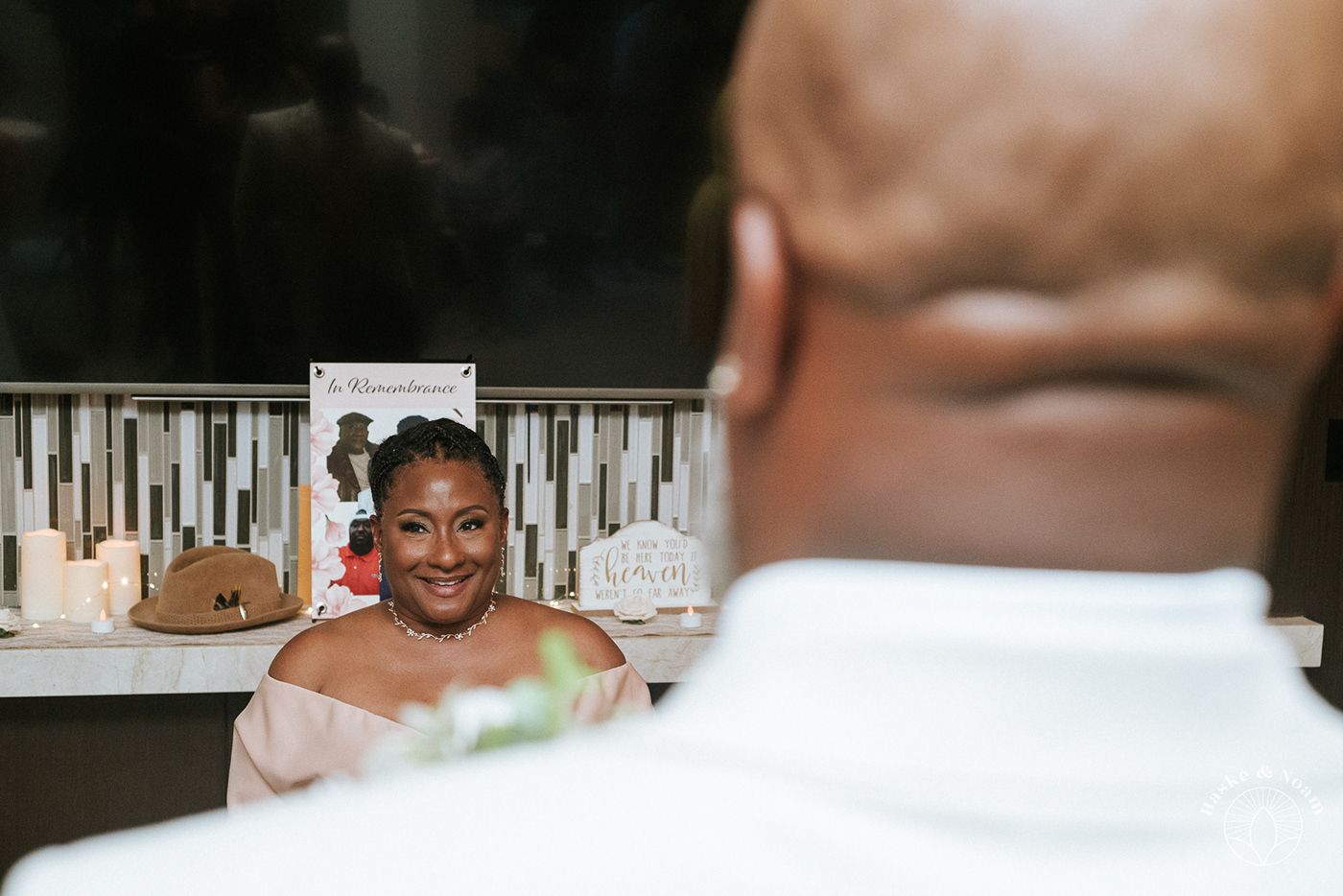 Intimate wedding portrait captured through reflection.