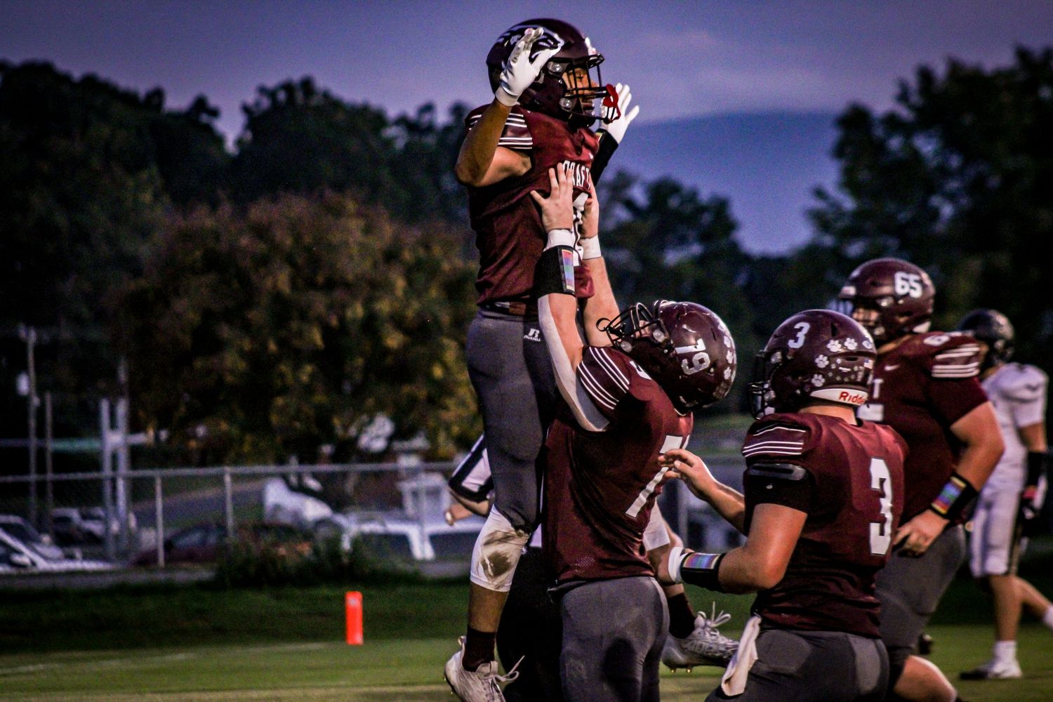 Juniors | Derrick Moore lifted by Landon Shifflett in post-touchdown celebration.
@addykaysports 2024.