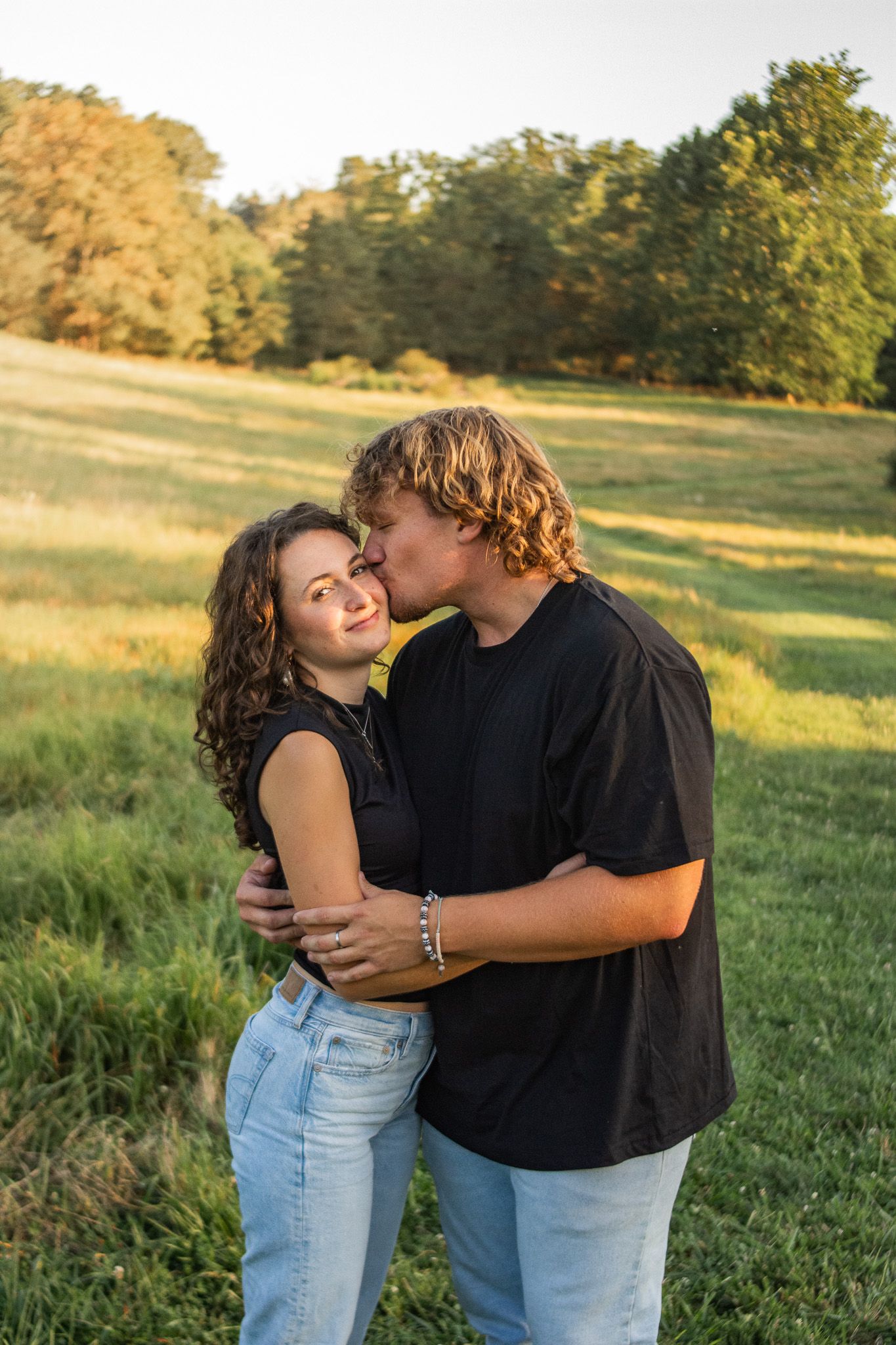 Boyfriend gives girlfriend gentle kisses.
@addykayphotography 2025.