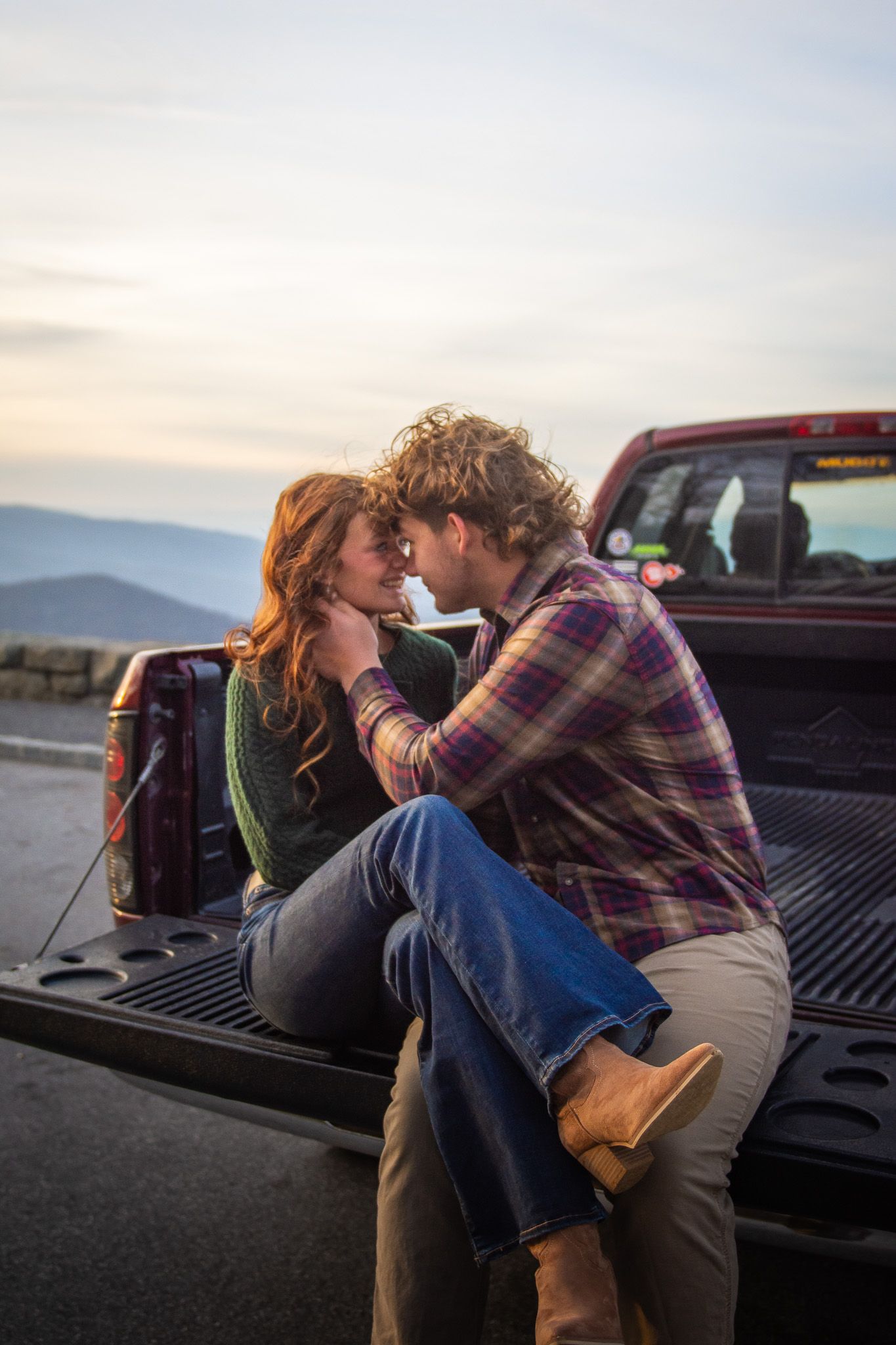 Couple poses on truck bed on Blue Ridge Parkway Overlook
@addykayphotography 2026.