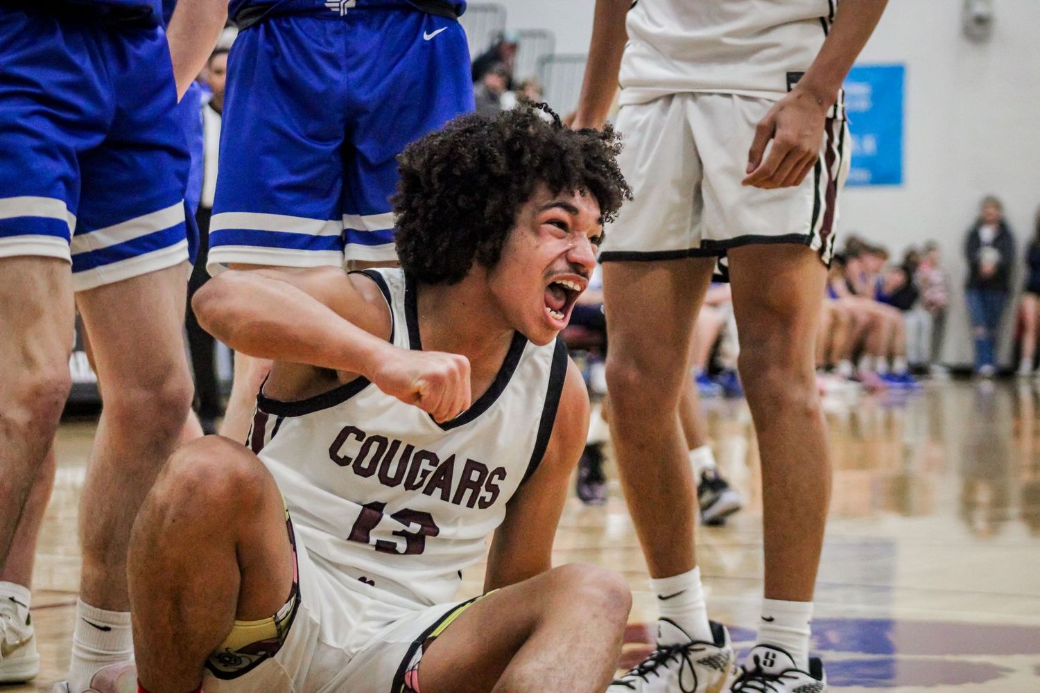 Junior PG, Derrick Moore #13 gets hyped for the next play.
@addykaysports 2024.