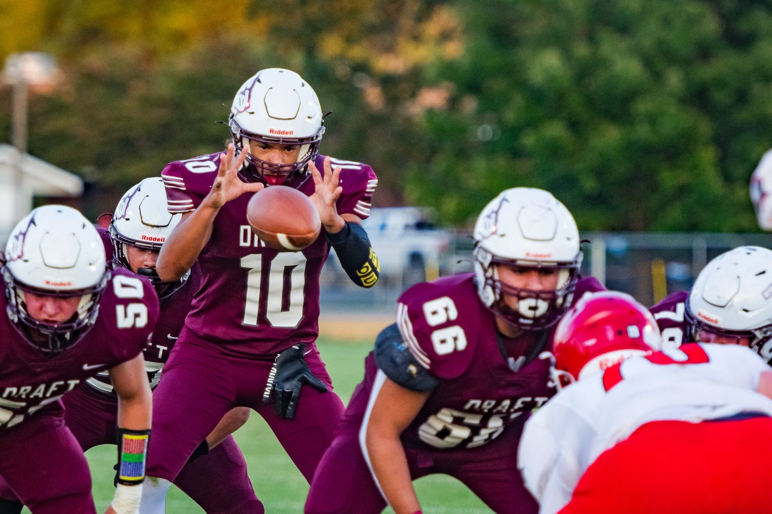 Senior QB Derrick Moore #10 snaps the ball.
@addykaysports 2025.