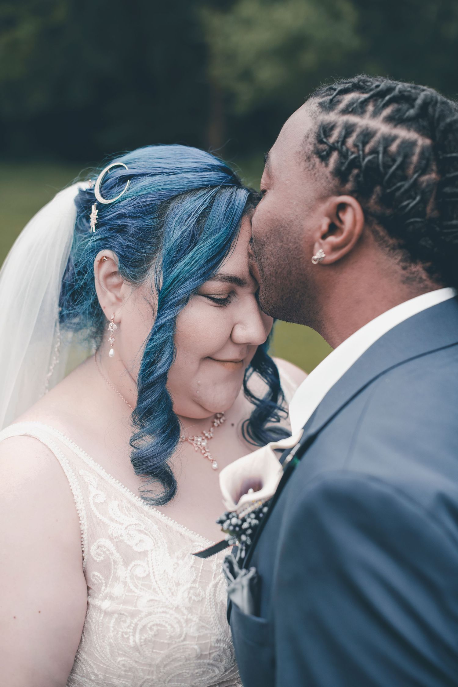 A romantic wedding couple shares intimate moments in a series of close-up shots showing blue hair and formal attire.