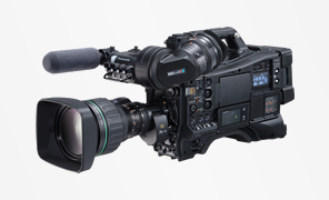Professional broadcast video camera with large lens and shoulder mount configuration.
