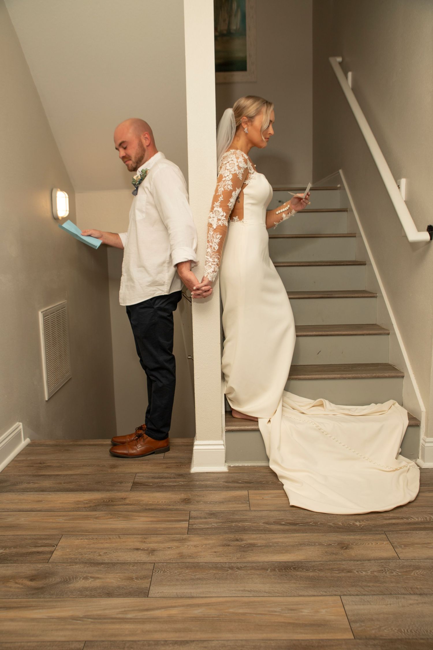 A series of photos showing a person in white dress and another in dark clothes inspecting something on wooden flooring.