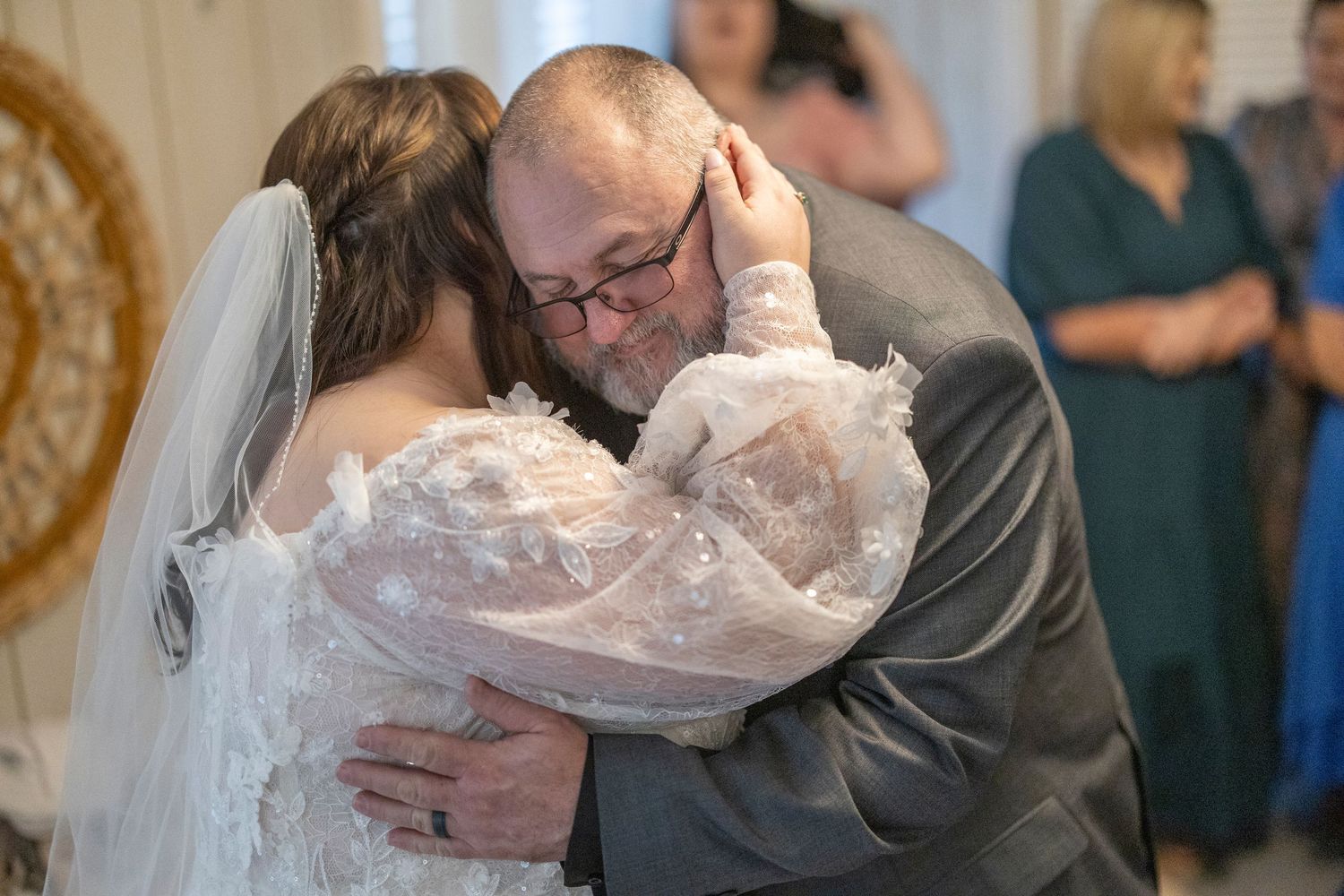 A sequence of five photos showing tender moments between a couple during their wedding celebration.