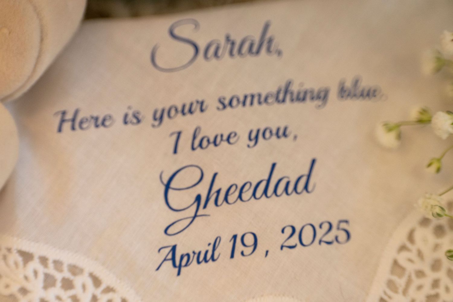 A handwritten note with 'I love you' and a date of April 19, 2025 written in blue ink on white paper.