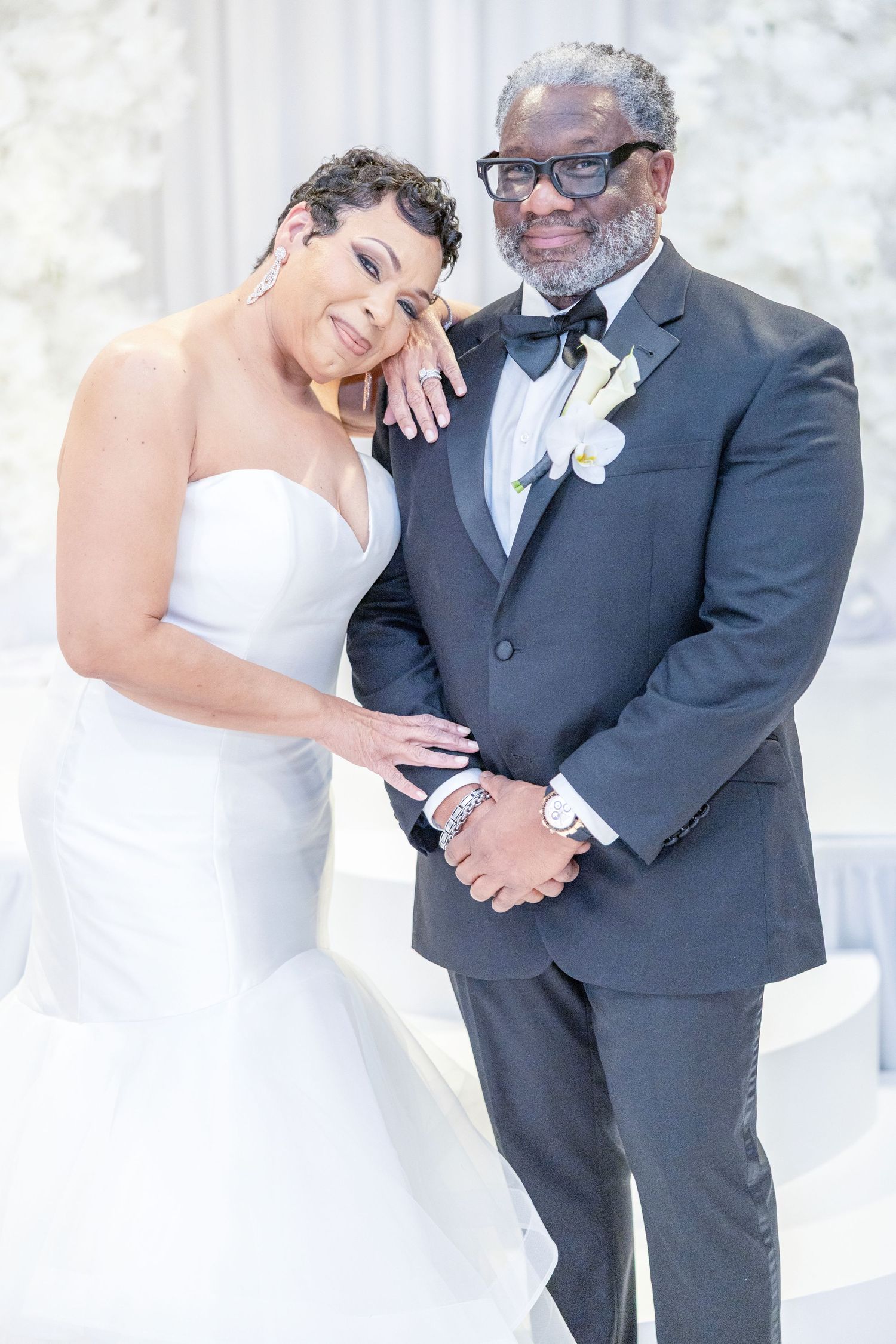 A romantic wedding couple embraces in a series of tender moments against a light background.