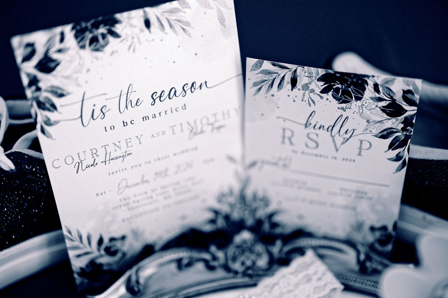 Elegant wedding invitations with delicate floral designs and calligraphy text arranged in a collage layout.