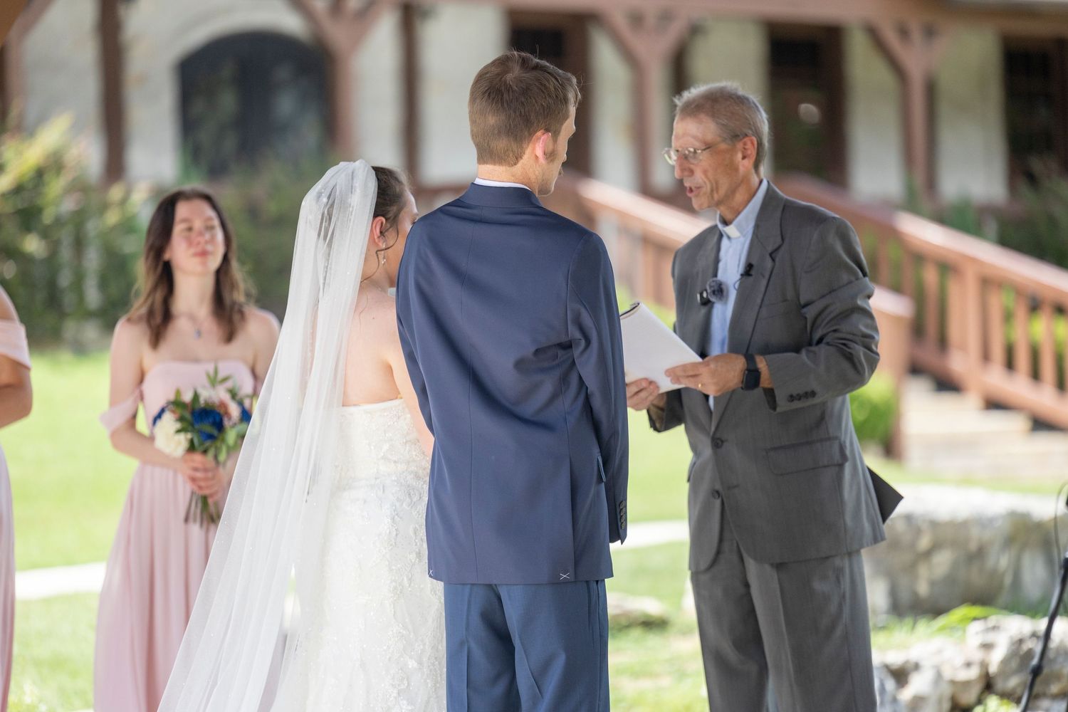 A wedding photo collage showing various moments from a ceremony and reception with couples and guests in formal attire.