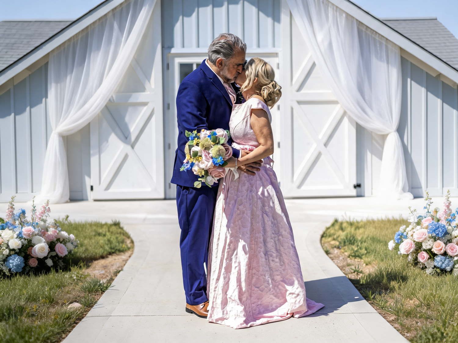 Couple kissing at outdoor barn wedding ceremony with pink sequin gown and navy suit on sunny day.