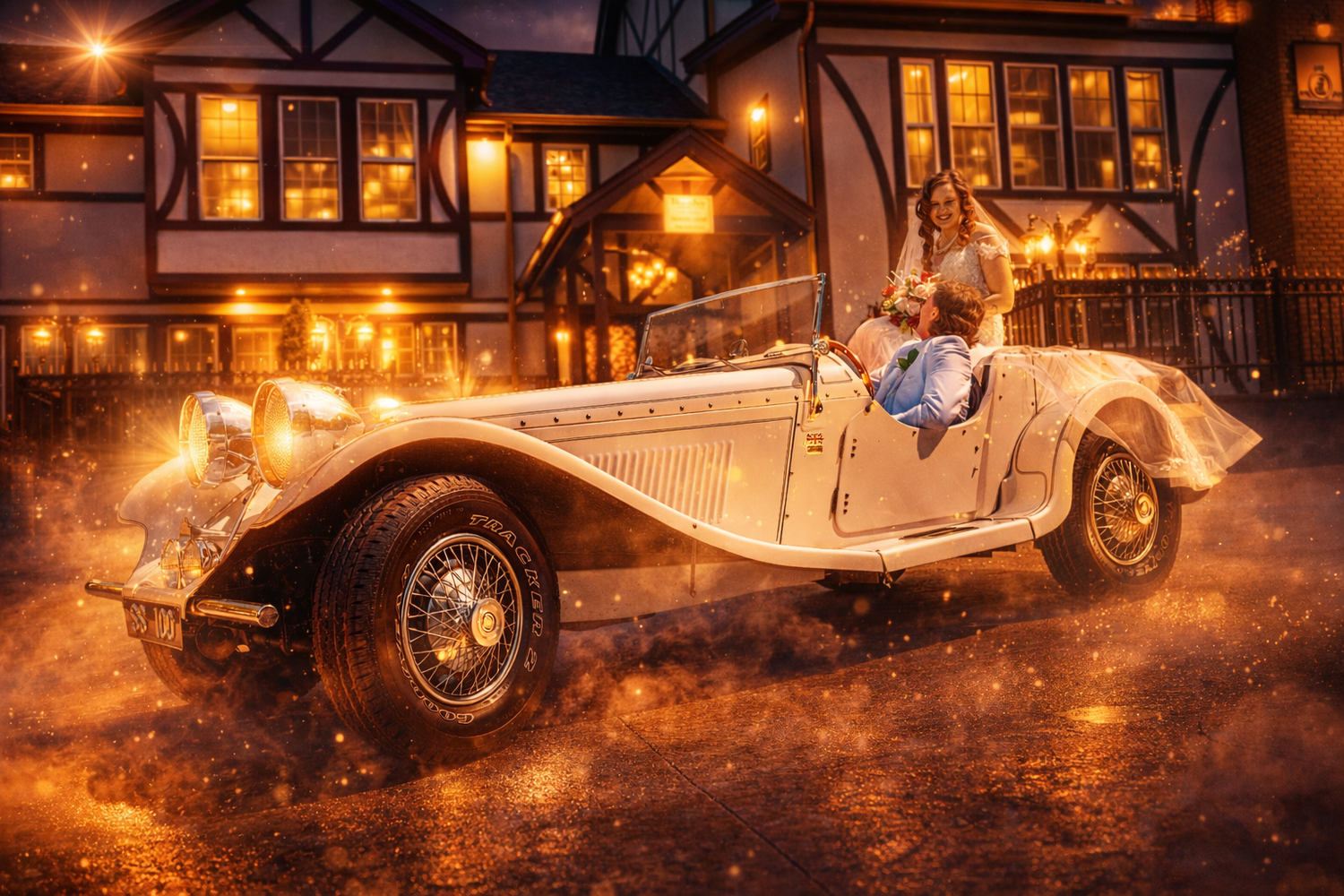 A woman sits in a vintage white convertible car outside a lit Tudor-style building on a rainy night.