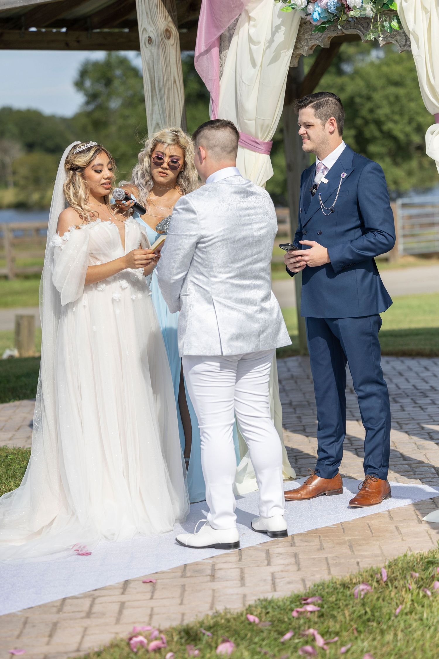 A sequence of wedding ceremony moments captured outdoors on a brick patio with guests in formal attire.
