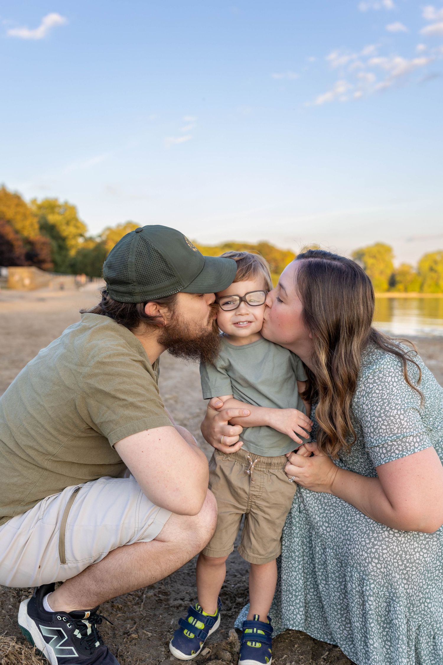 A couple shares tender moments together in an outdoor photoshoot series at sunset.