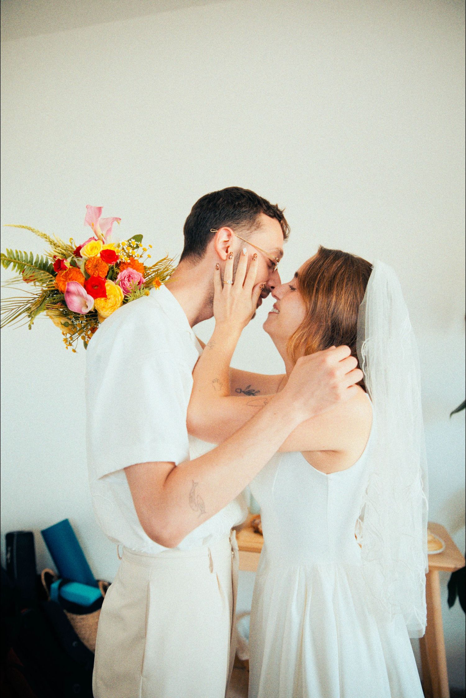 An intimate wedding moment captured in a sequence of romantic poses.