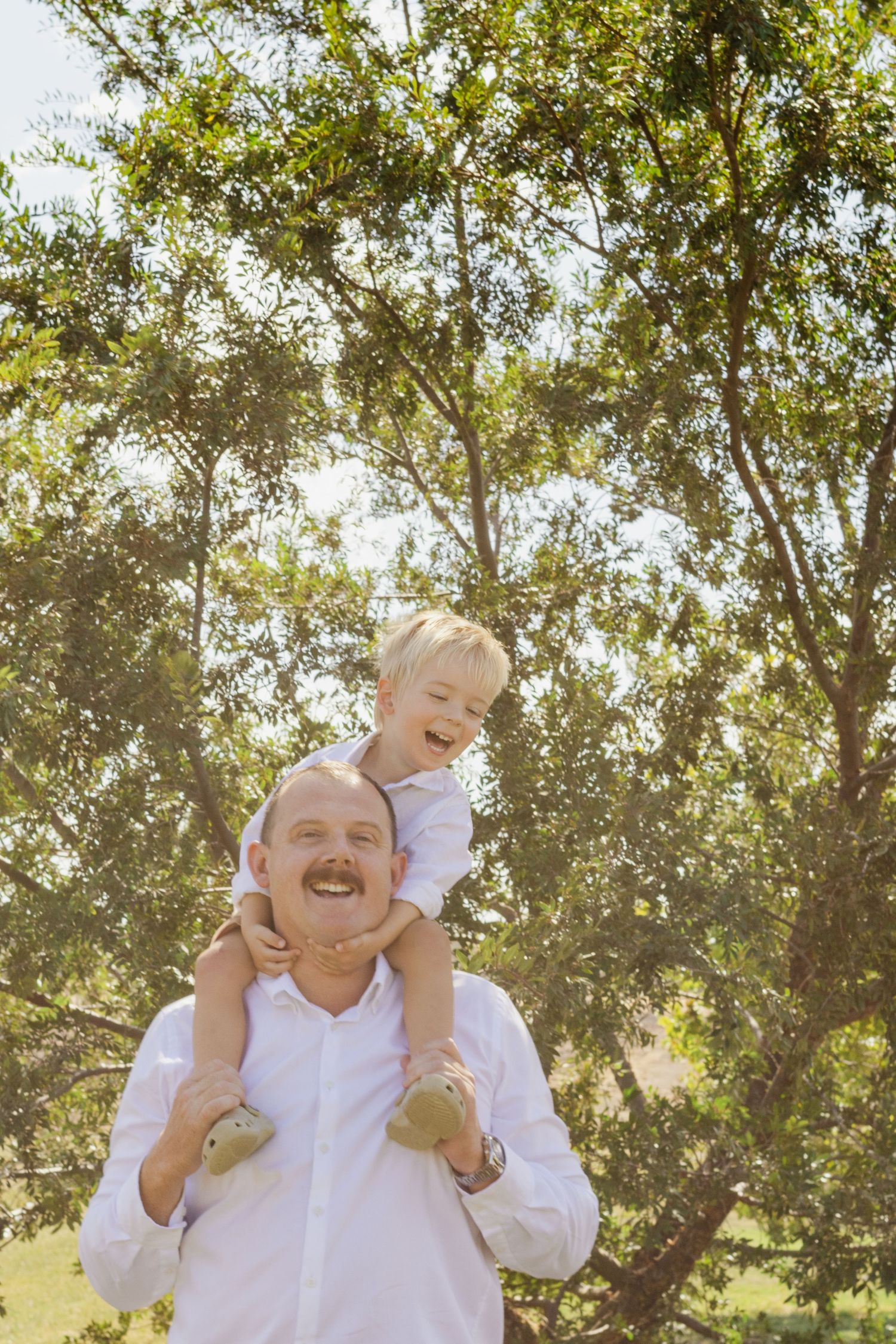 Father son photo candid smiling