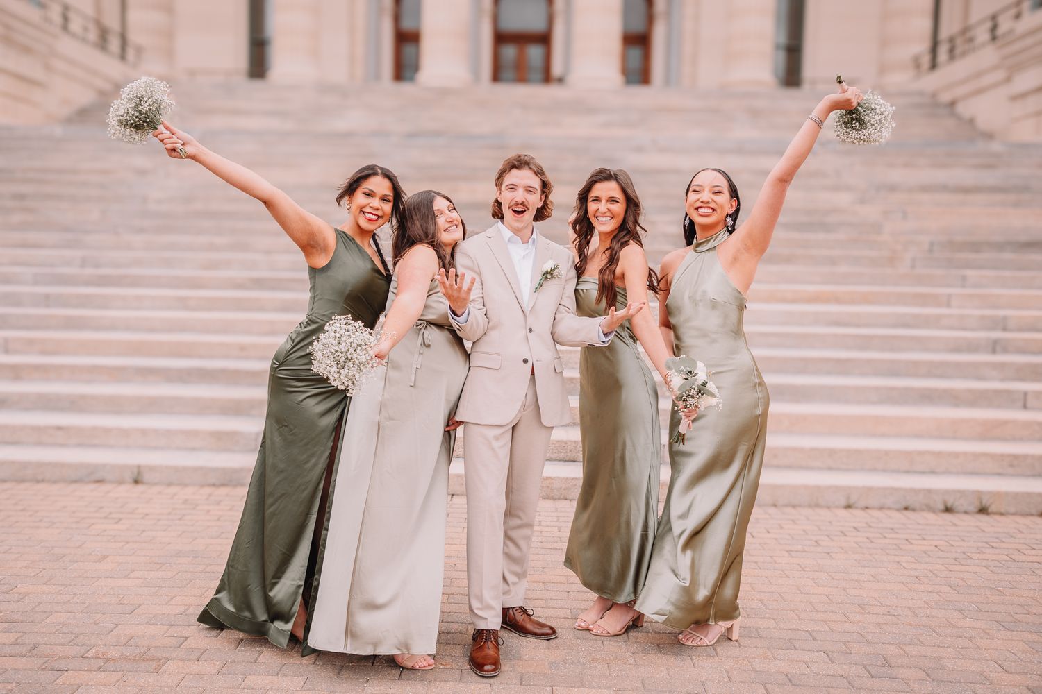 Wedding Portraits at the Topeka, KS Capitol building. Wedding party Portraits. Groom and bridesmaids.