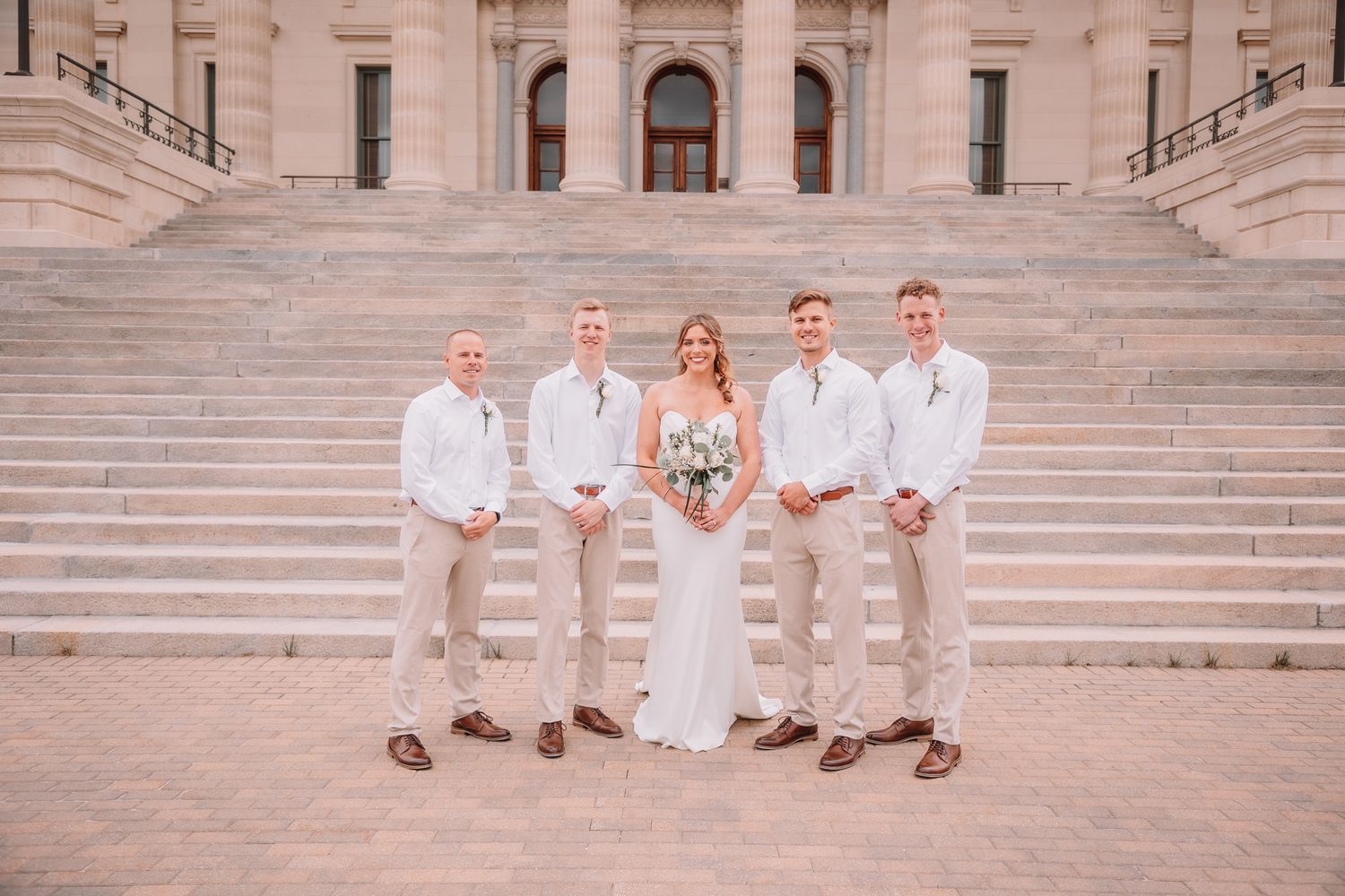 Wedding Portraits at the Topeka, KS Capitol building. Family Portraits. Bride and Family.