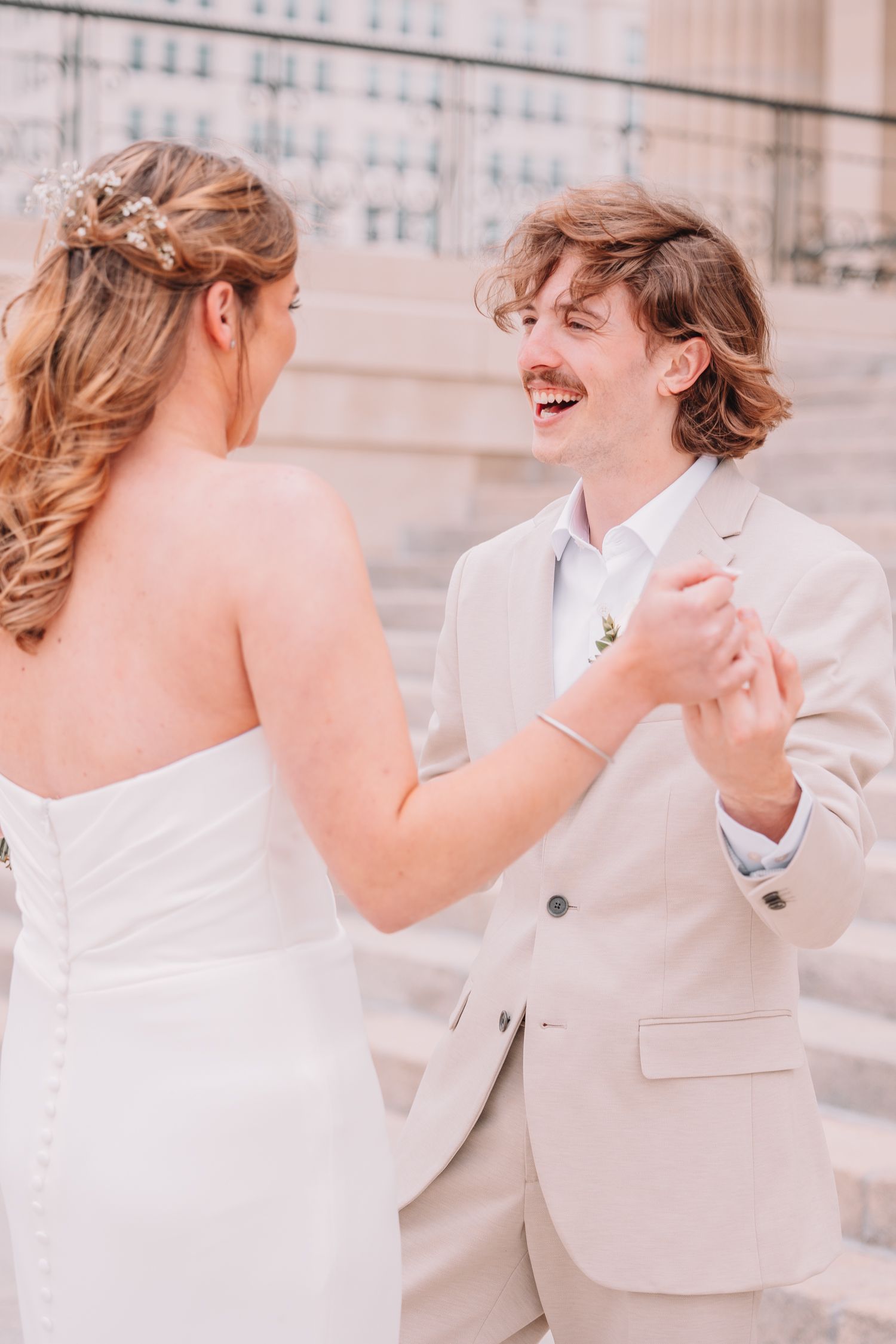 Romantic Wedding Photo of bride and groom at The Capitol building in Topeka, KS. First-look.