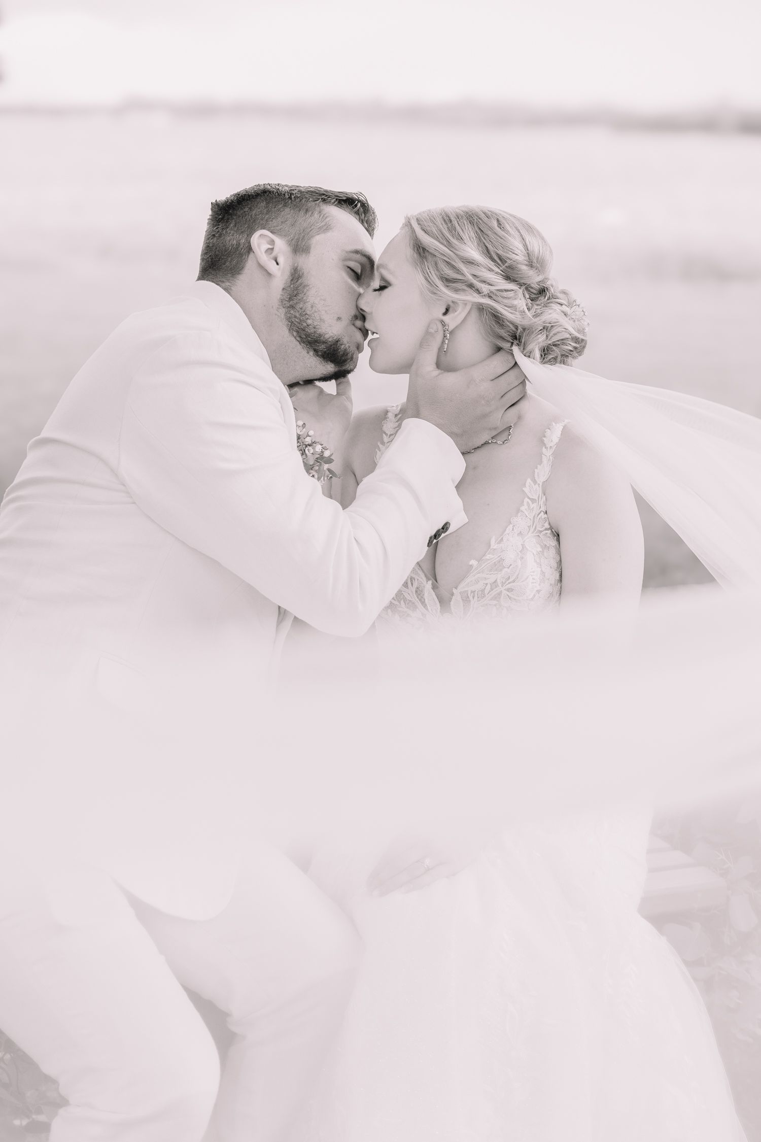 Romantic photo of bride and groom at the Brownstone. Wedding photos in Topeka, KS.
