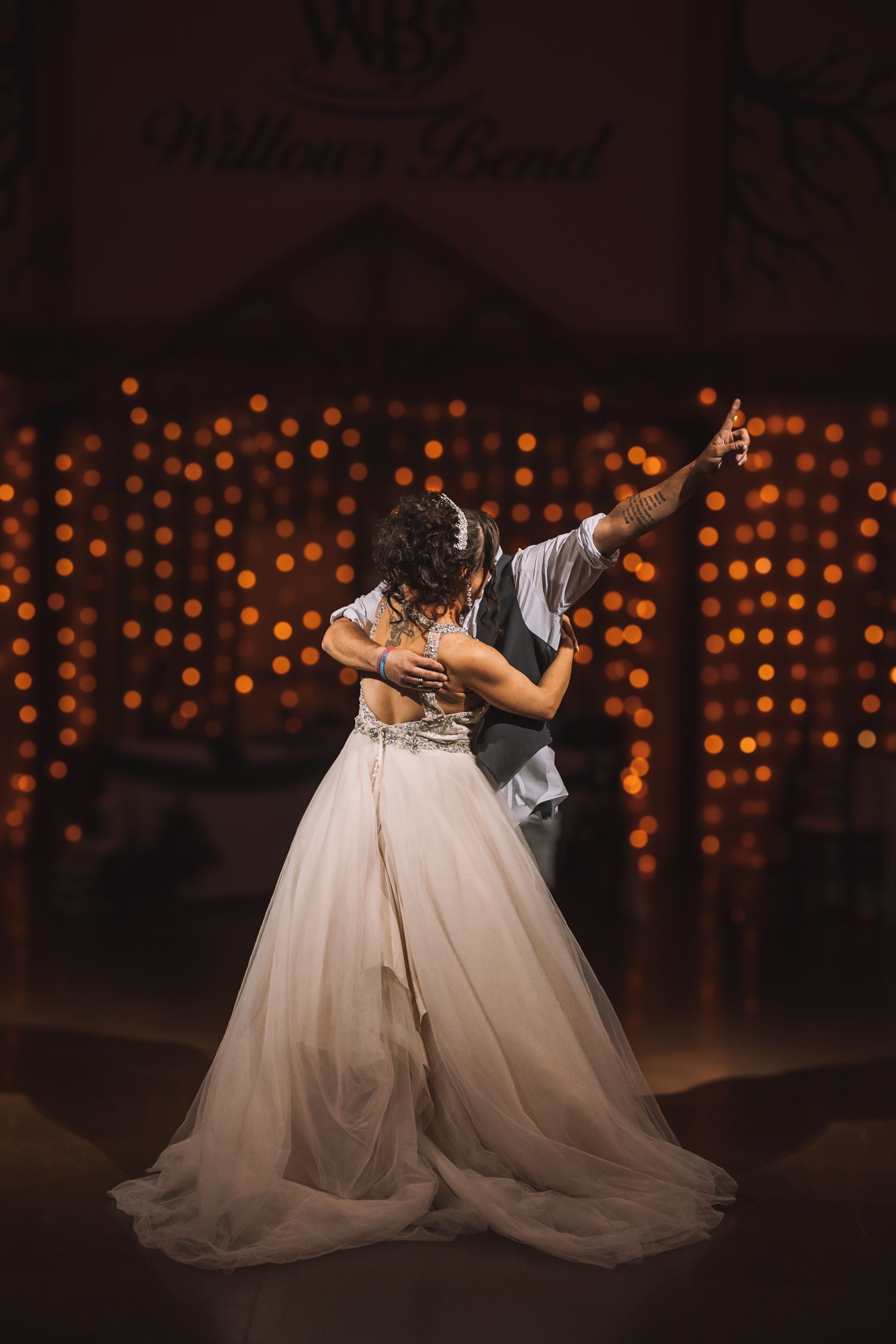 Romantic photo of bride and groom first dance at Willow's Bend.  Wedding photos in Kansas.